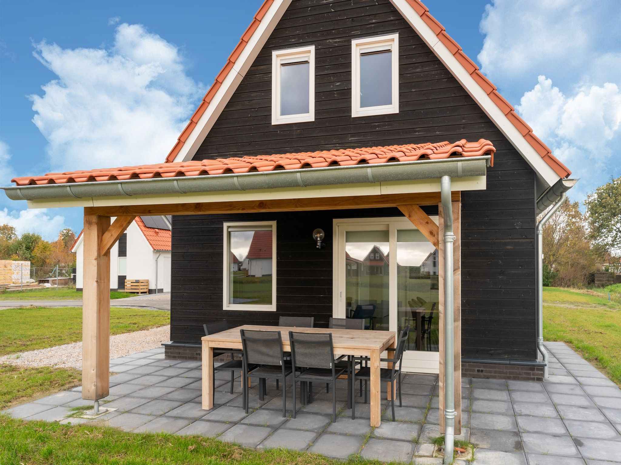 Het terras van De Kokmeeuw Huis Nr 11 in Scherpenisse