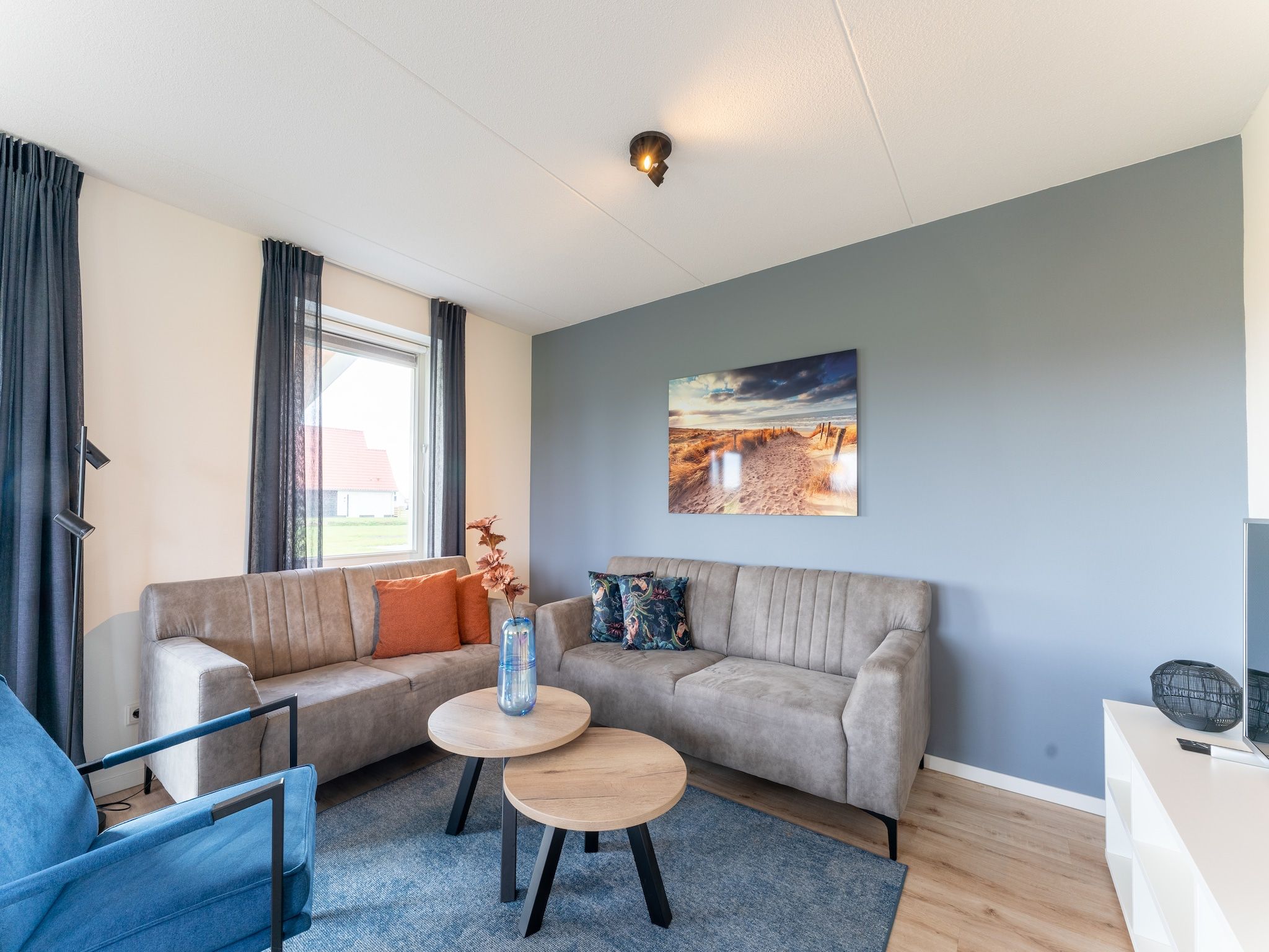 De woonkamer van De Kokmeeuw Huis Nr 11 in Scherpenisse