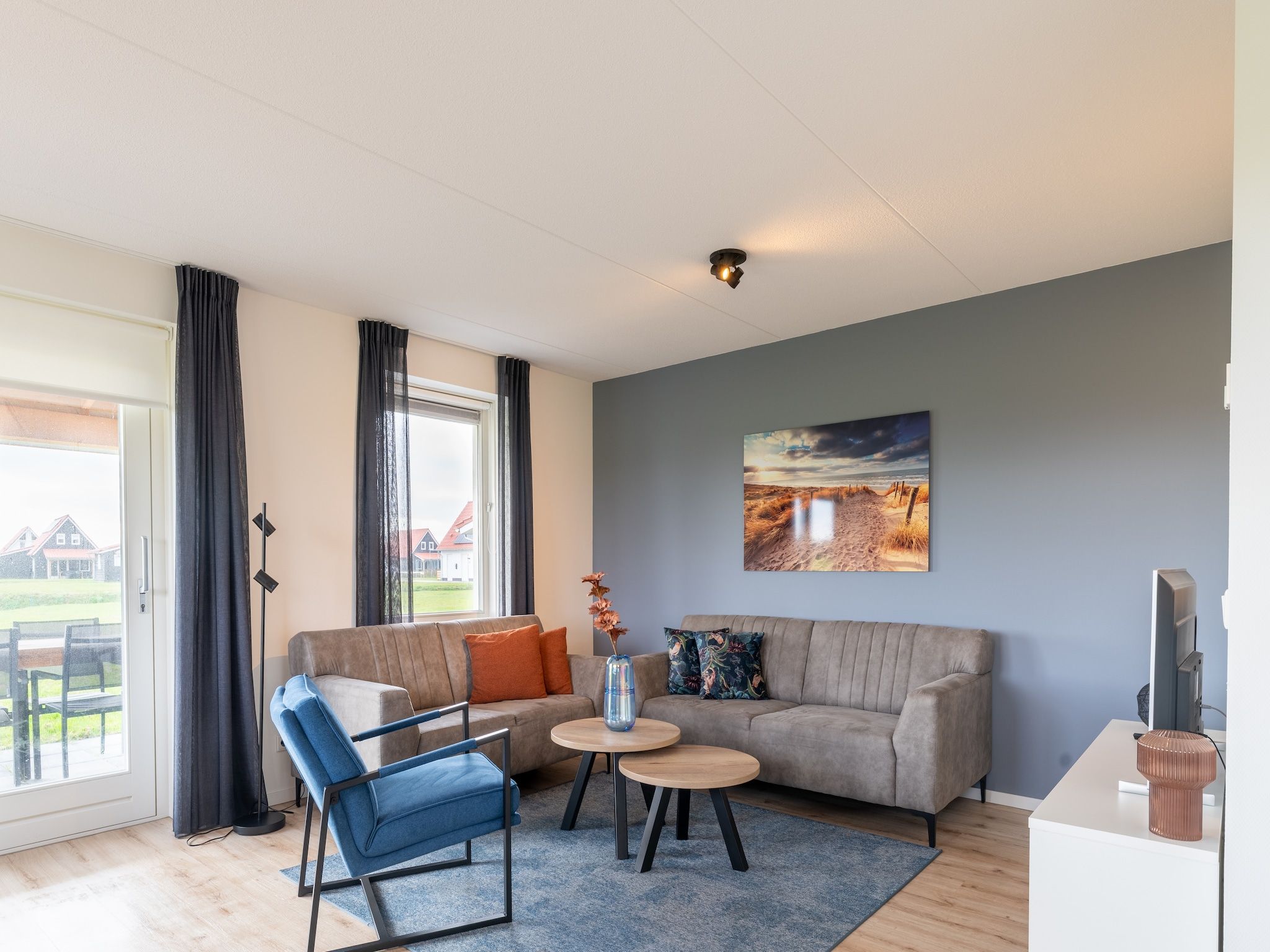 De woonkamer van De Kokmeeuw Huis Nr 11 in Scherpenisse