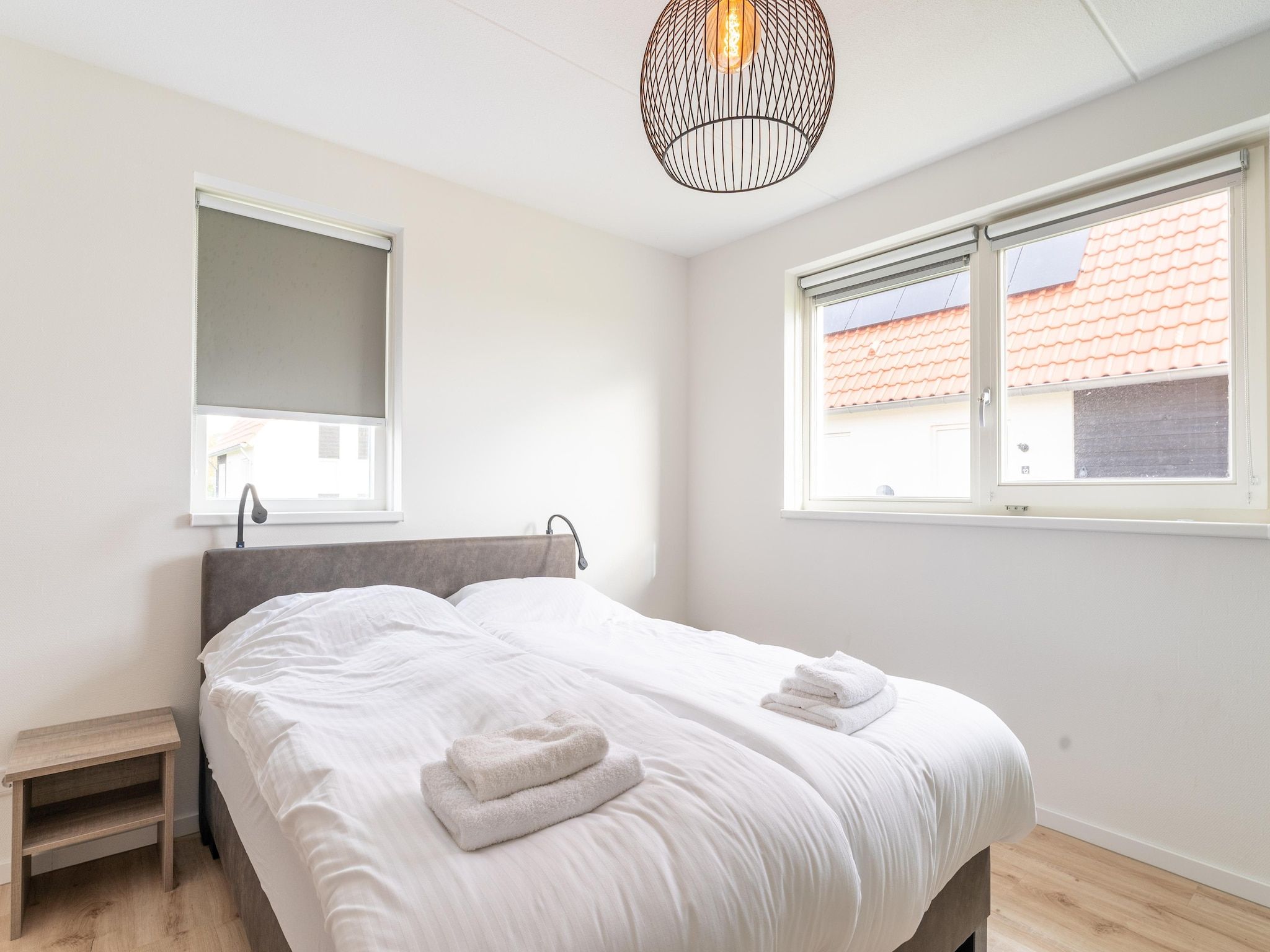 Een slaapkamer van De Lepelaar Huis Nr 13 in Scherpenisse