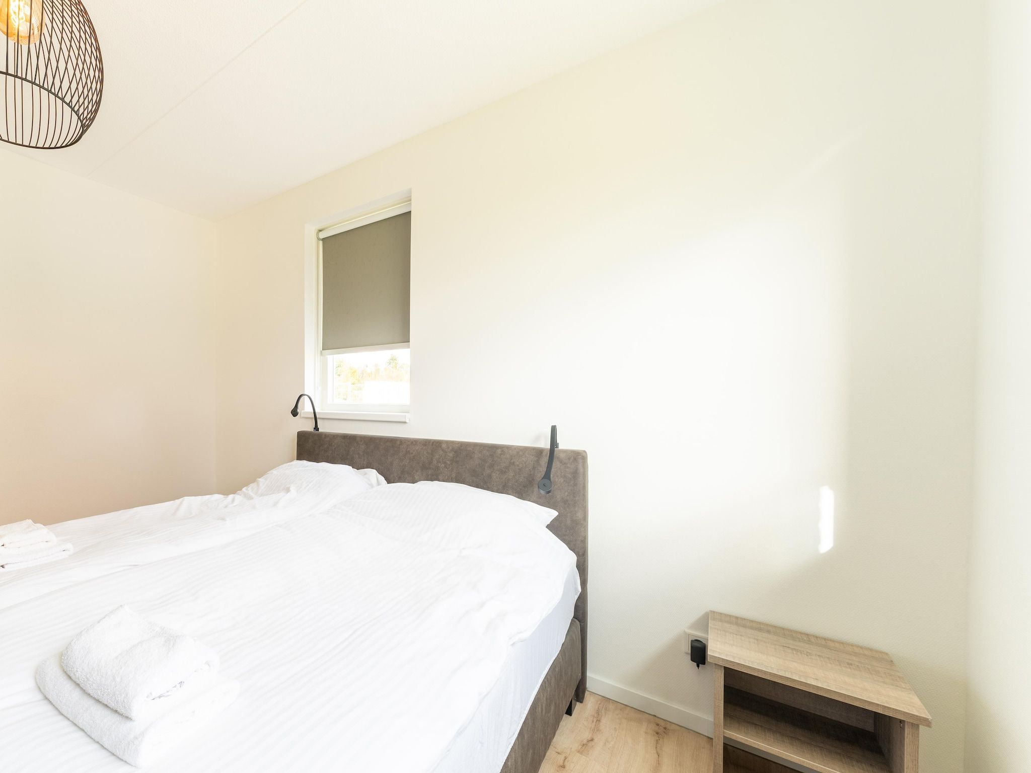 Een slaapkamer van De Lepelaar Huis Nr 13 in Scherpenisse