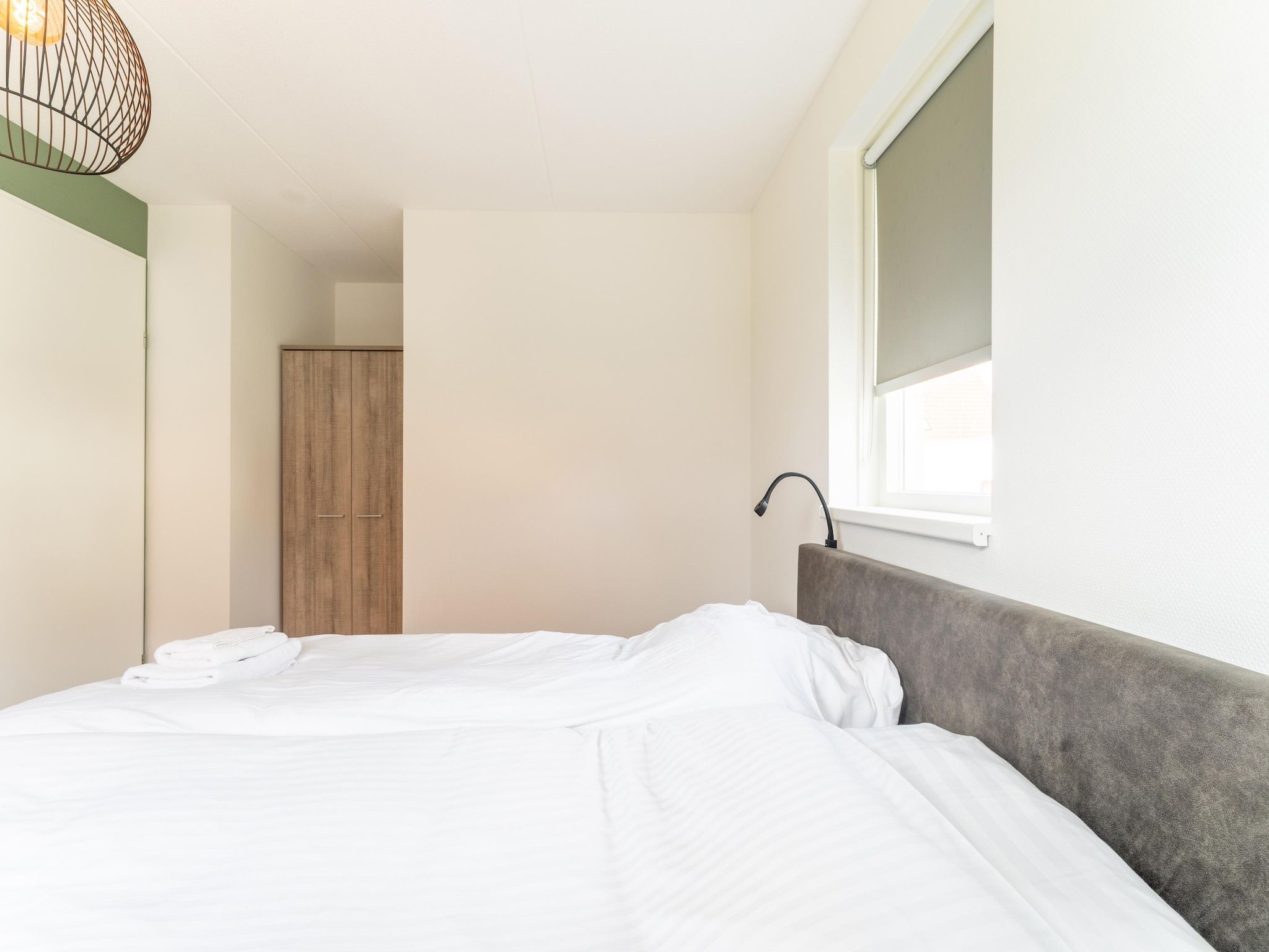 Een slaapkamer van De Lepelaar Huis Nr 13 in Scherpenisse