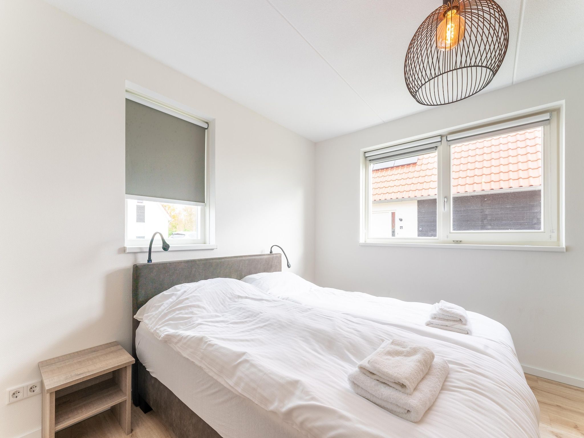 Een slaapkamer van De Lepelaar Huis Nr 13 in Scherpenisse