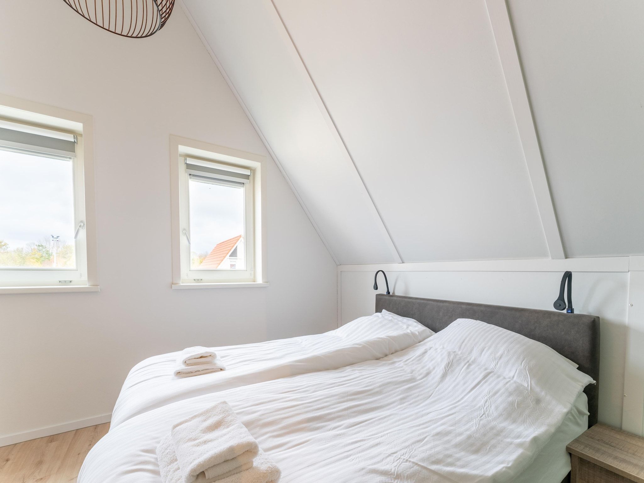 Een slaapkamer van De Lepelaar Huis Nr 13 in Scherpenisse