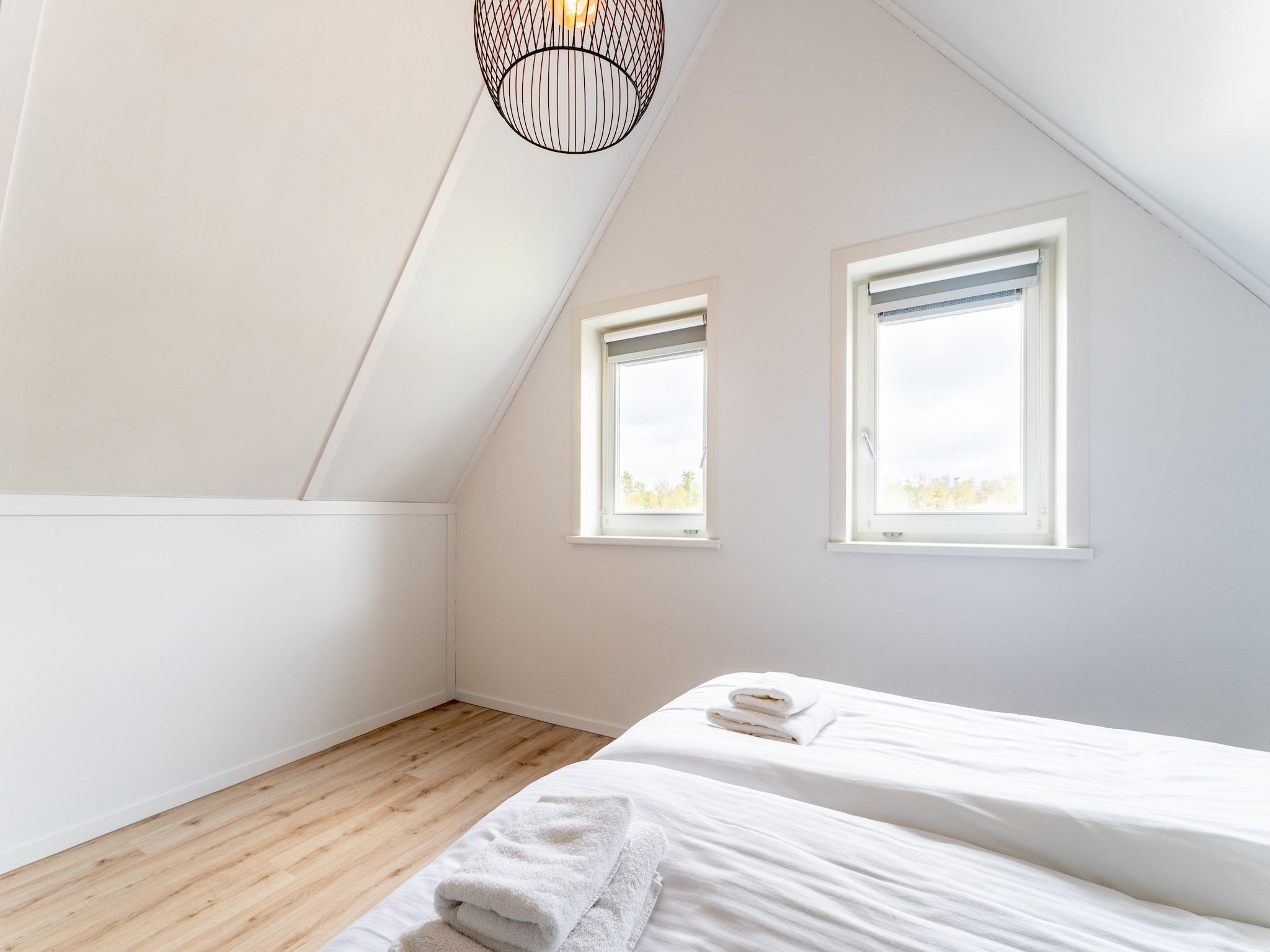 Een slaapkamer van De Lepelaar Huis Nr 13 in Scherpenisse