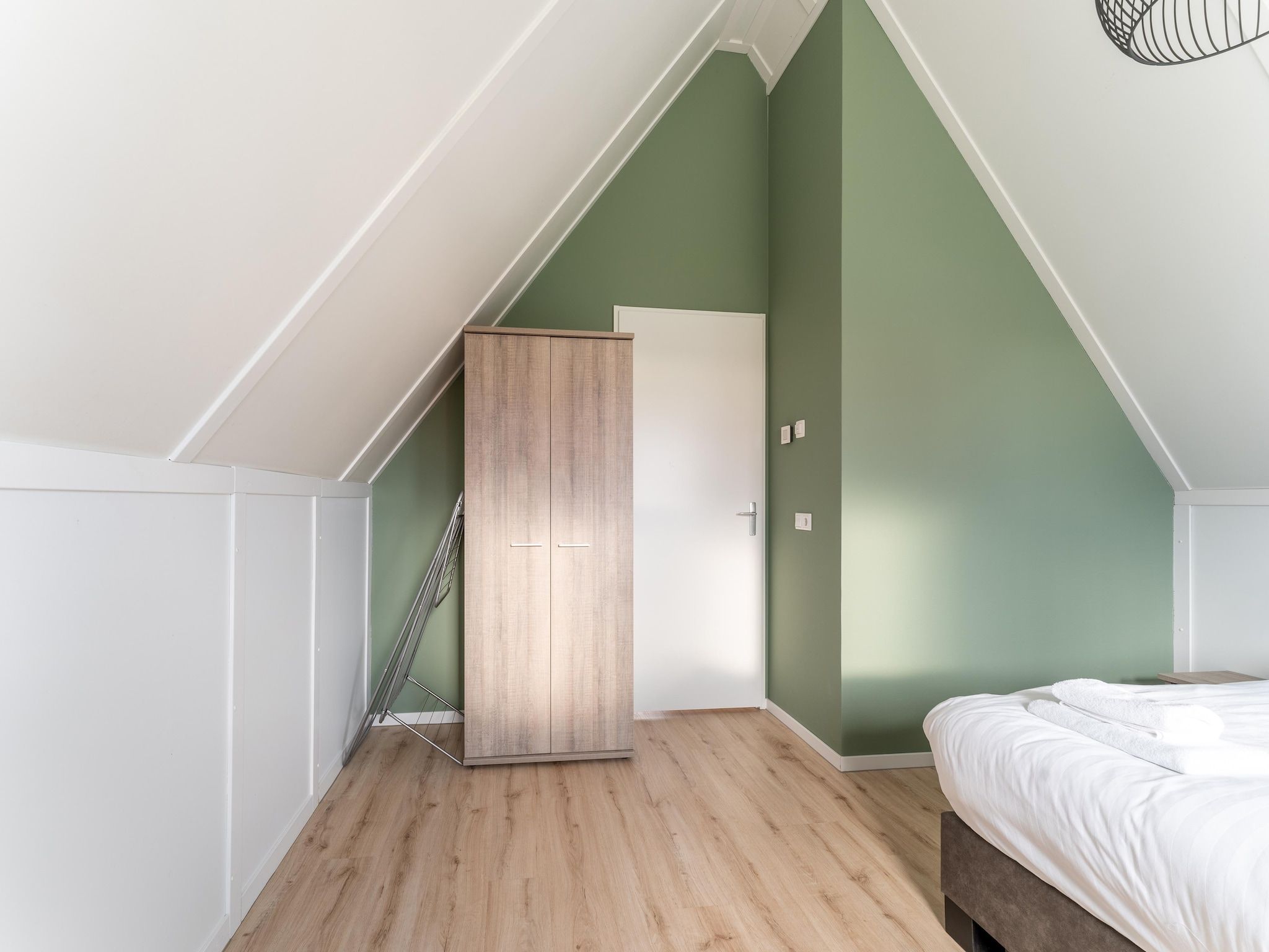 Een slaapkamer van De Lepelaar Huis Nr 13 in Scherpenisse