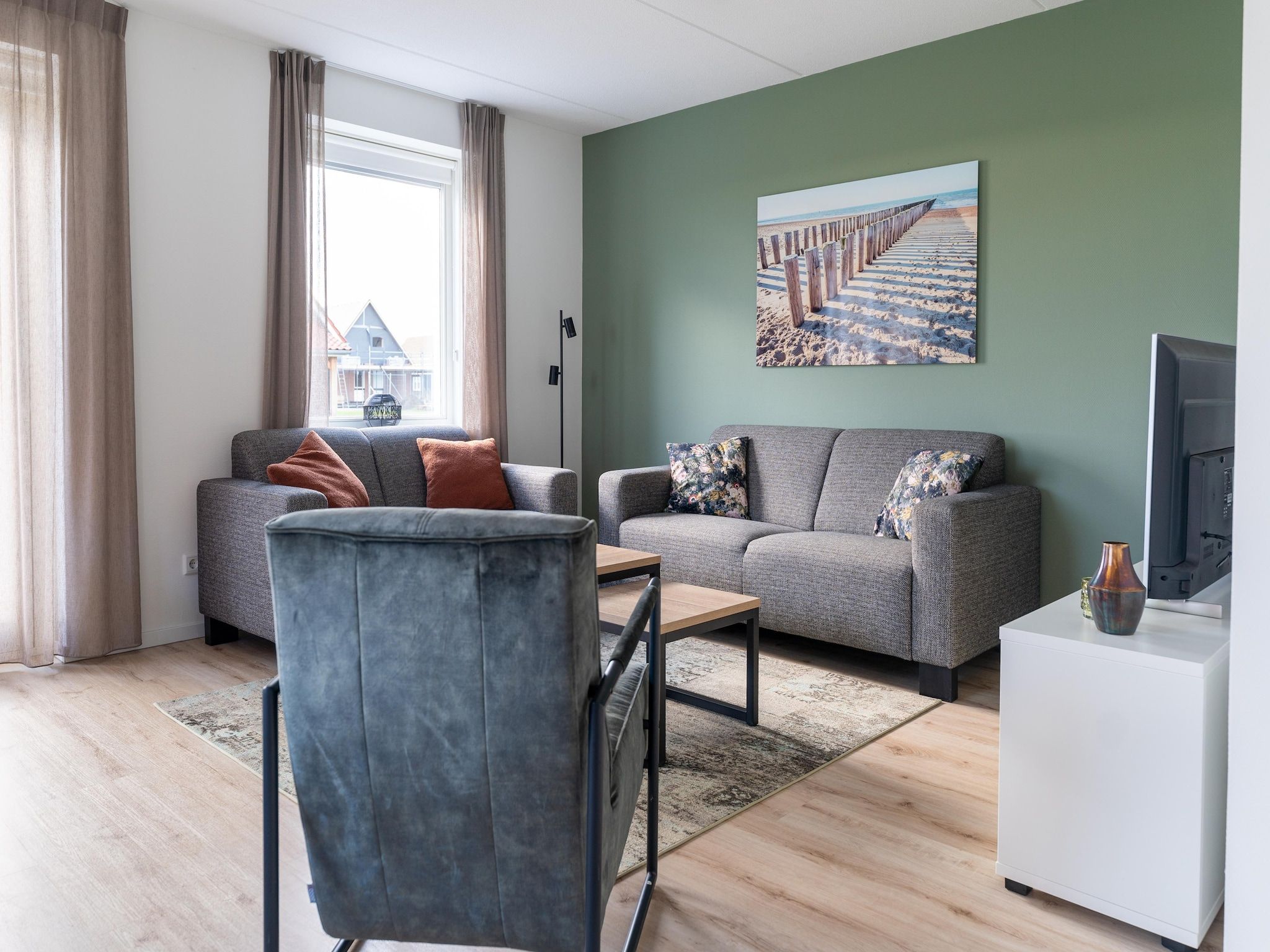 De woonkamer van De Lepelaar Huis Nr 13 in Scherpenisse