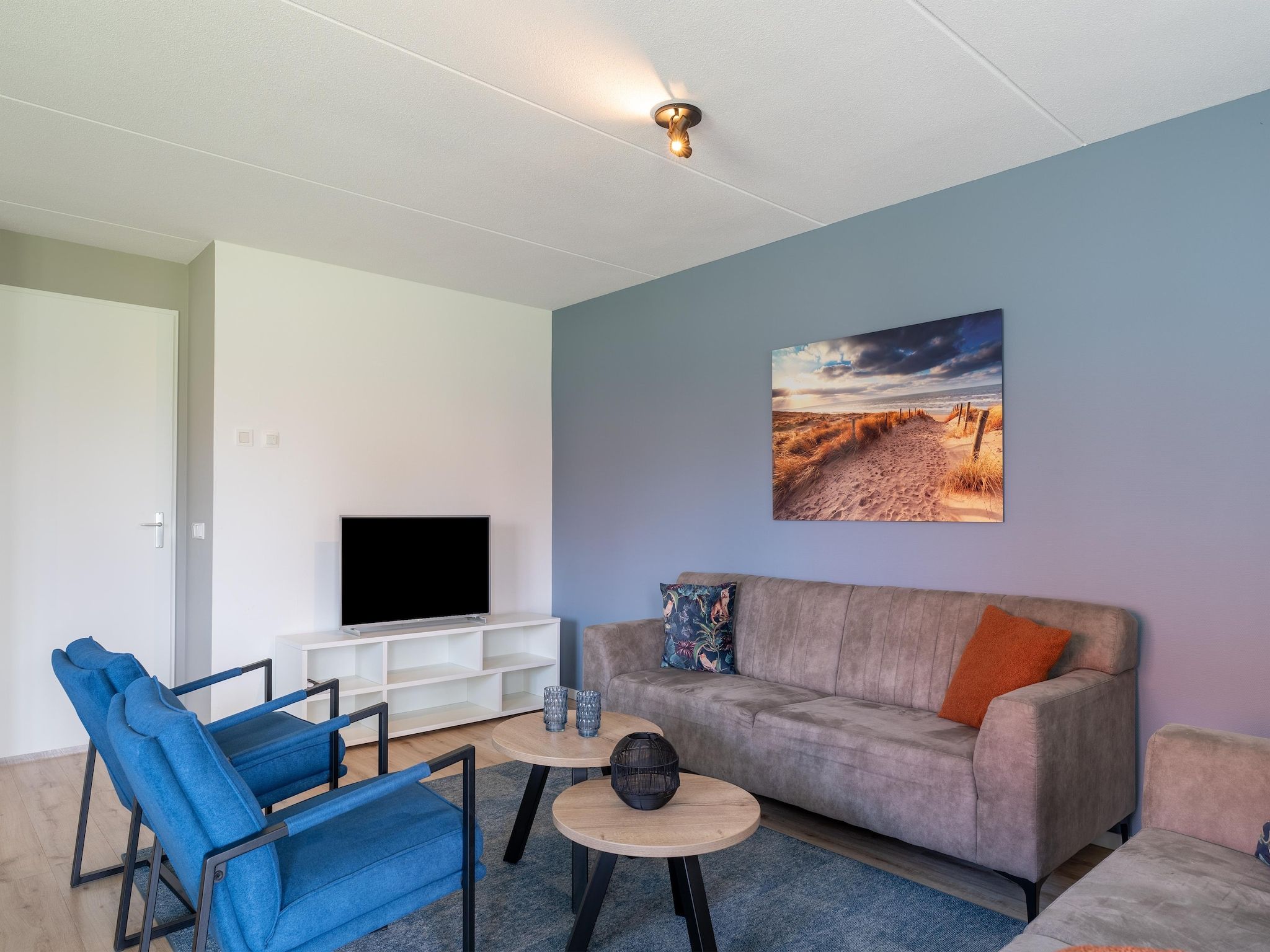 De woonkamer van De Scholekster Huis Nr 14 in Scherpenisse