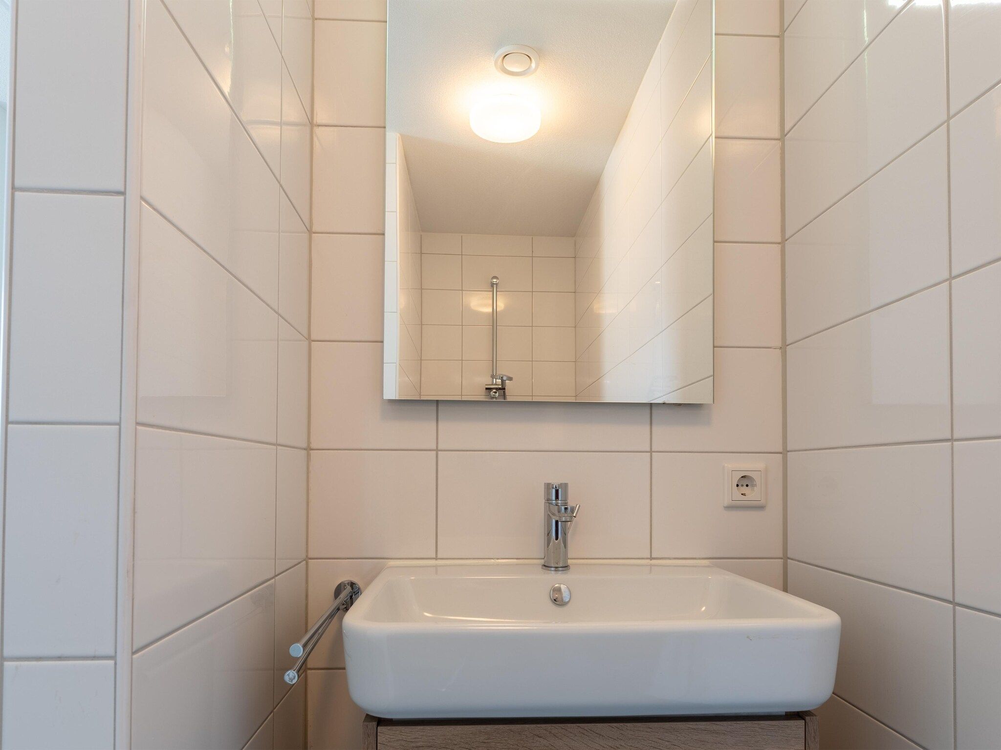 De badkamer van De Scholekster Huis Nr 14 in Scherpenisse