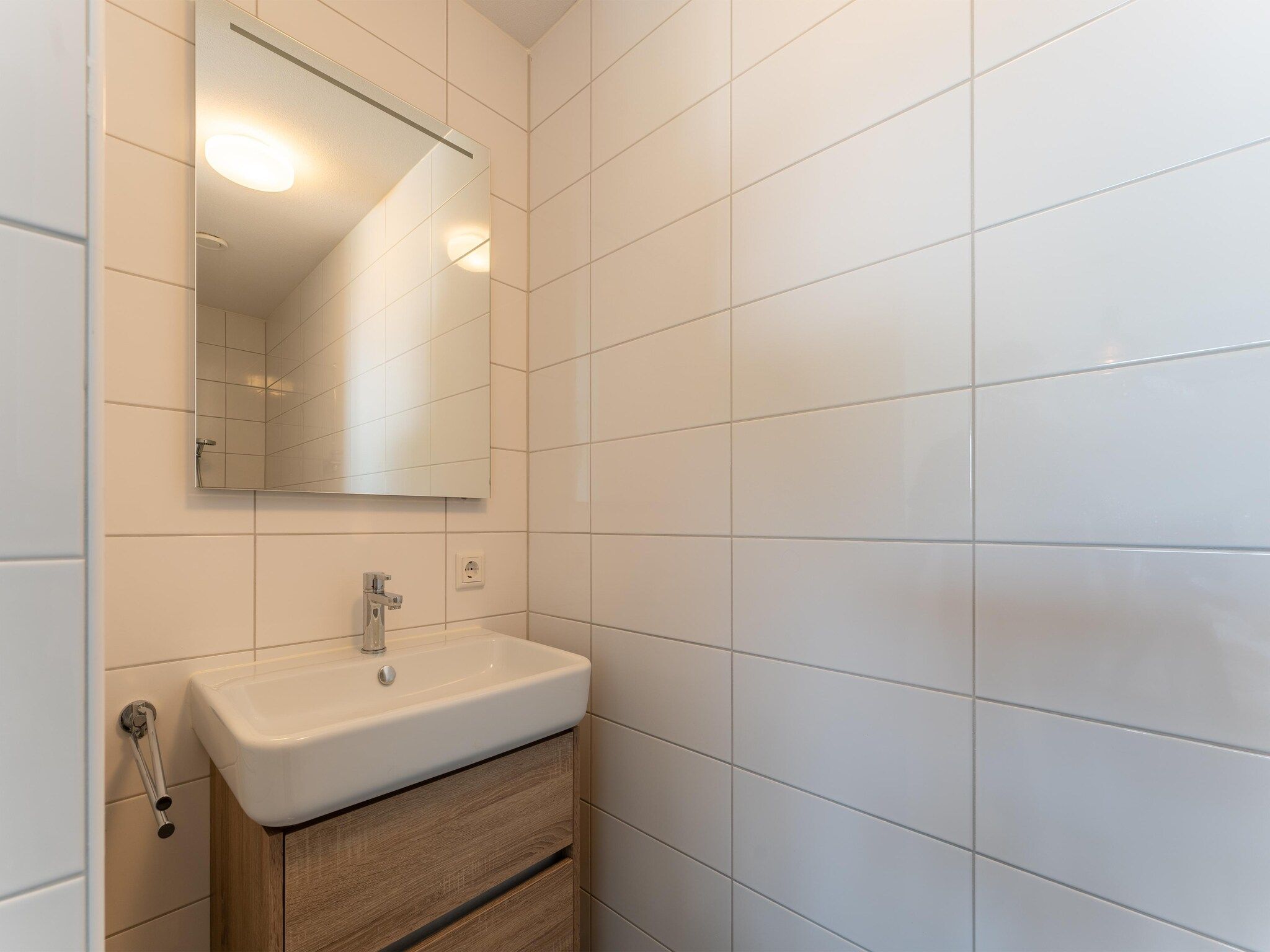 De badkamer van De Scholekster Huis Nr 14 in Scherpenisse