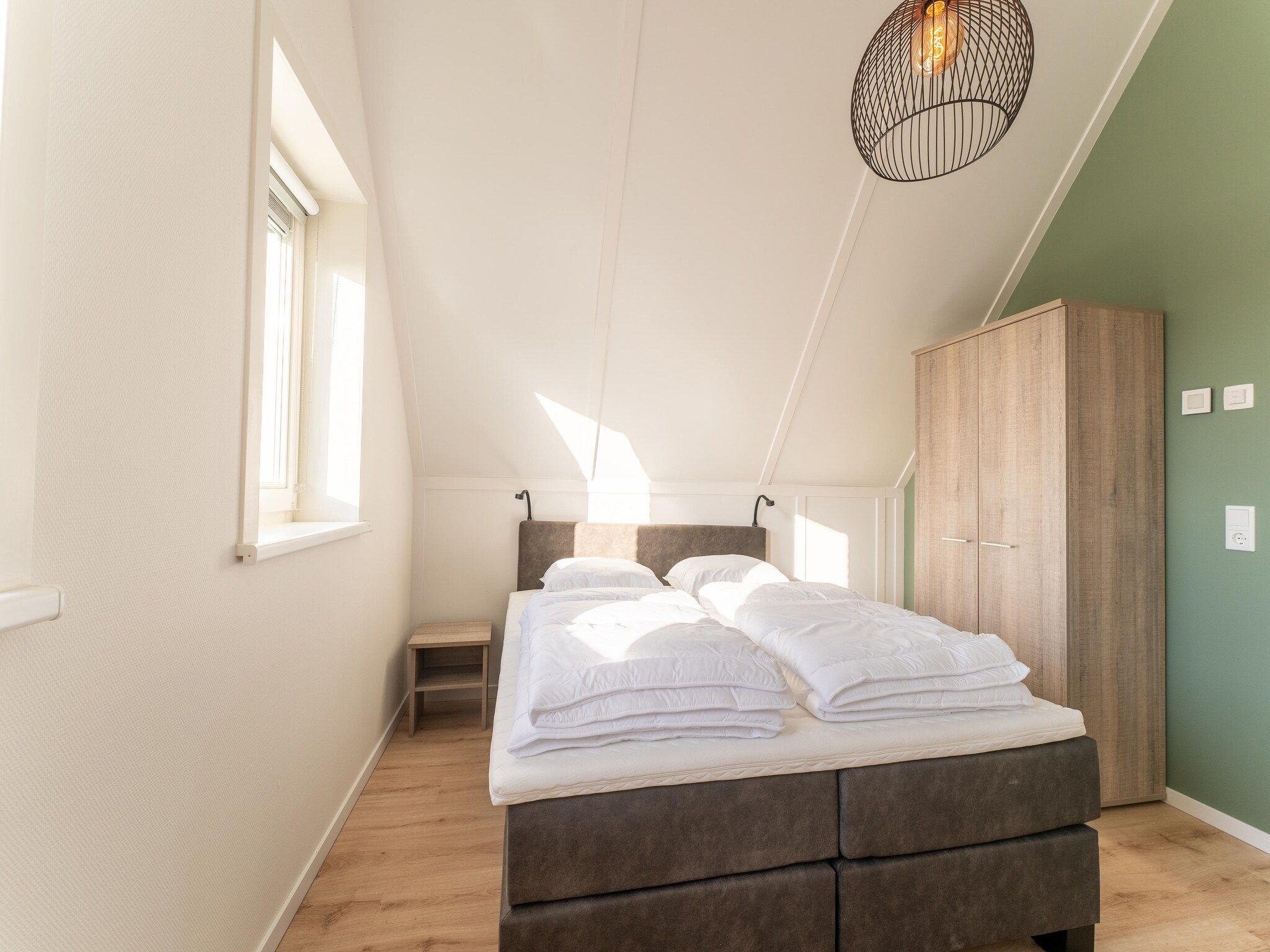 Een slaapkamer van De Smient Huis  Nr 42 in Scherpenisse