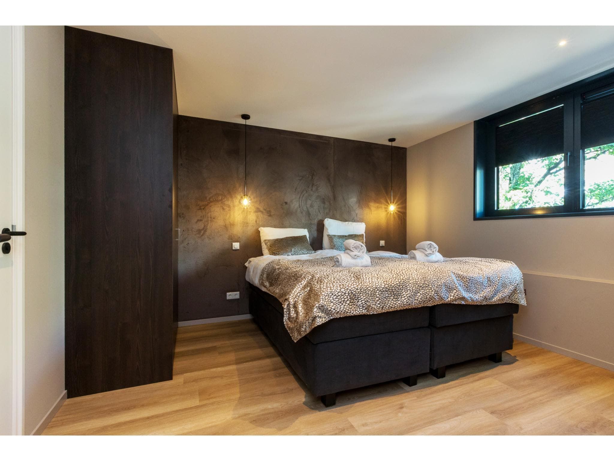Een slaapkamer van Ooststraat 8a in Domburg