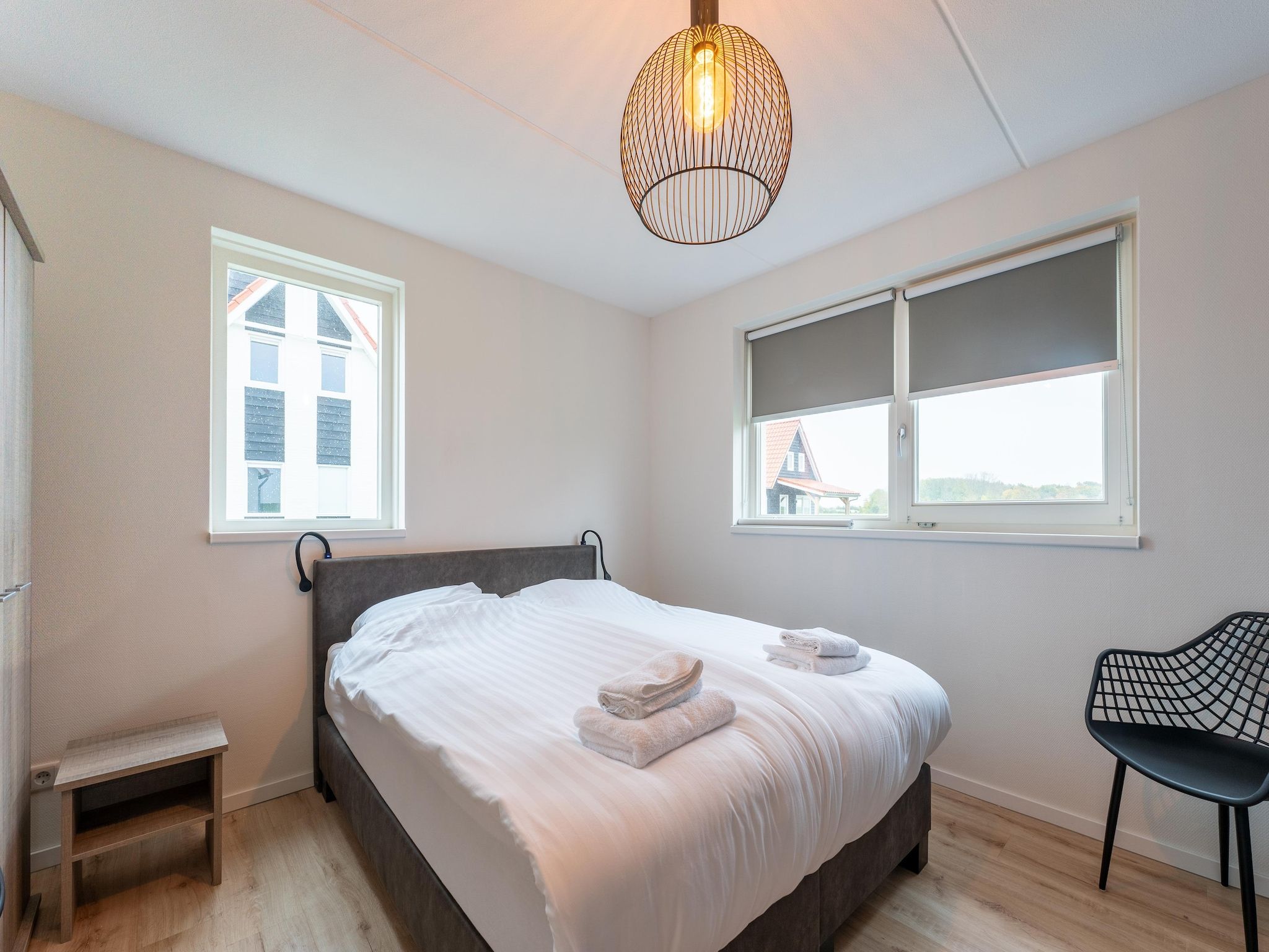 Een slaapkamer van De Wulp Huis Nr 50 in Scherpenisse