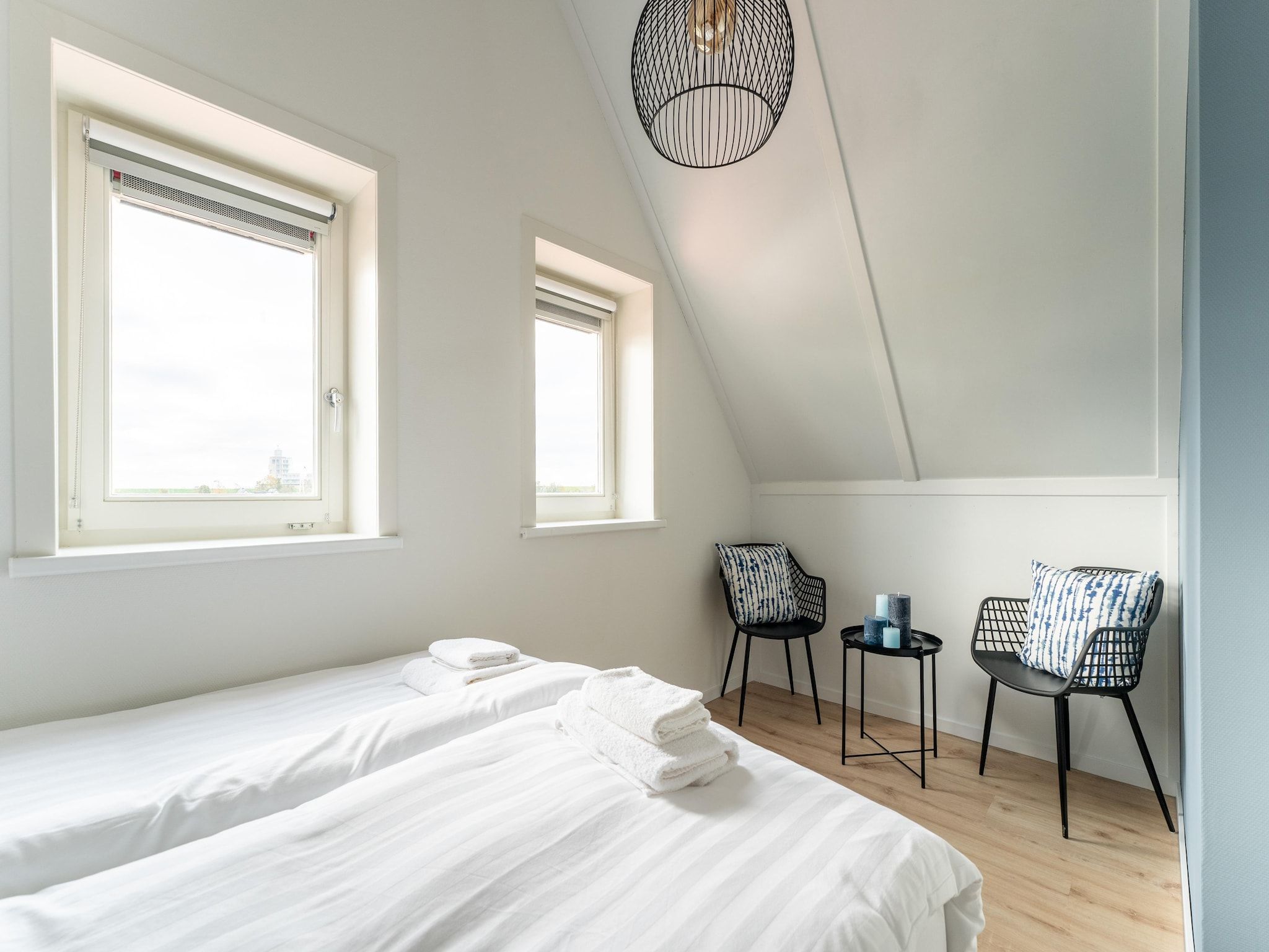 Een slaapkamer van De Wulp Huis Nr 50 in Scherpenisse