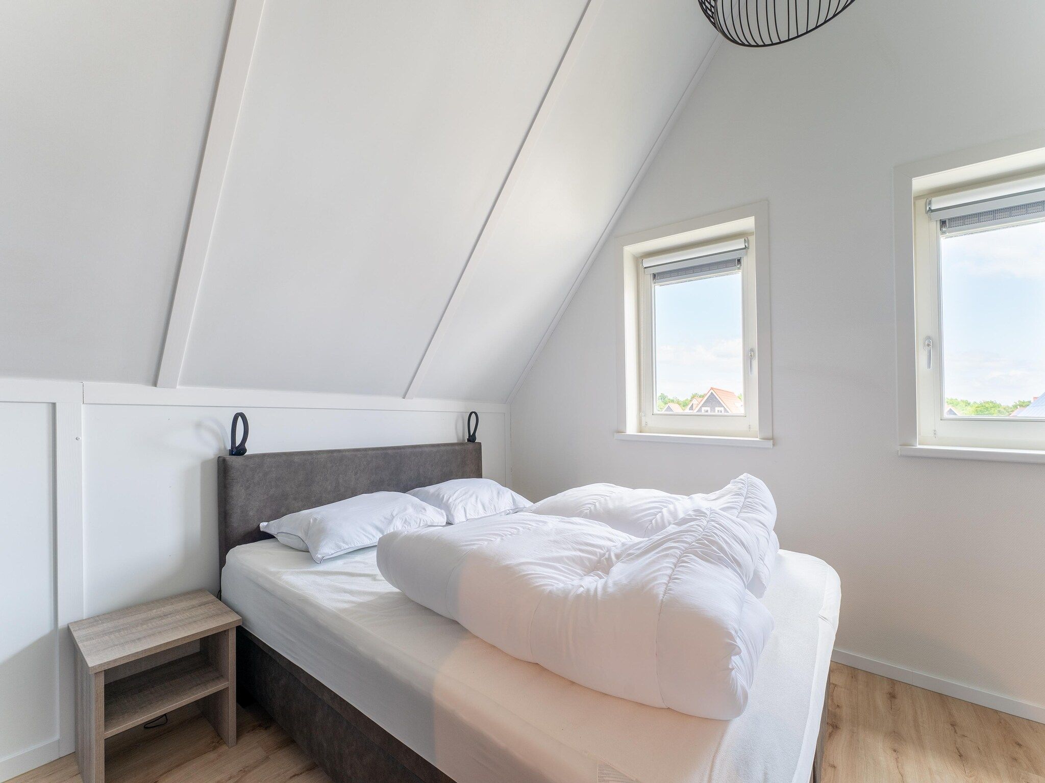 Een slaapkamer van Wulpdal Huis Nr 51 in Scherpenisse