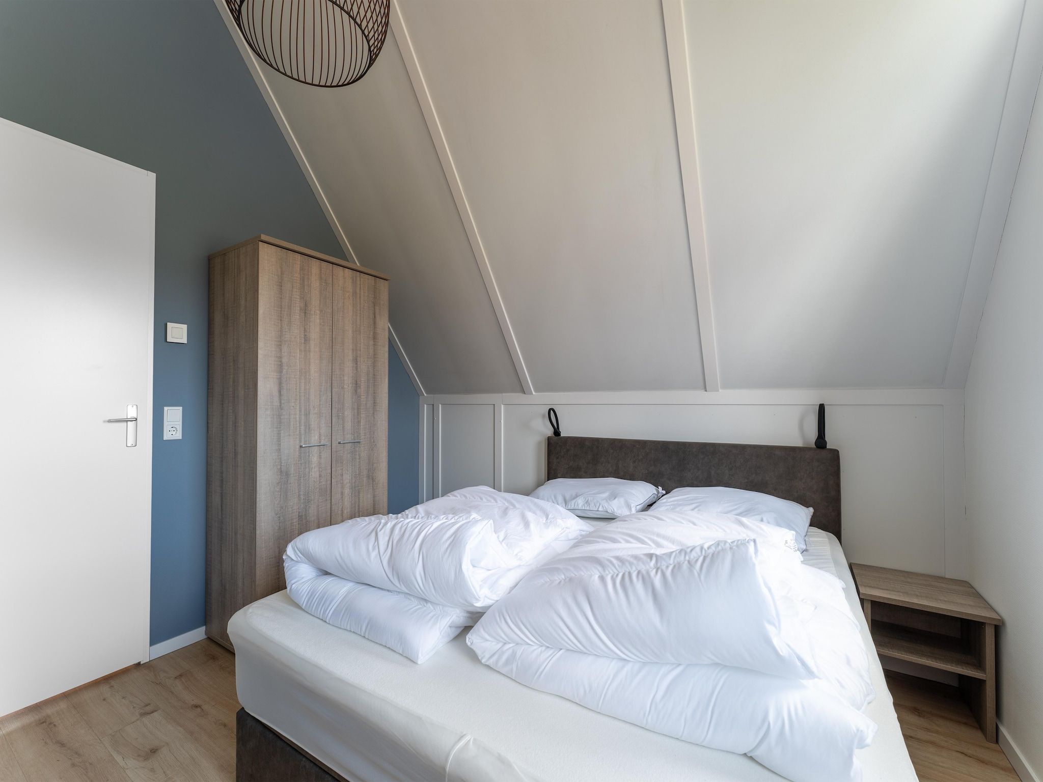 Een slaapkamer van Wulpdal Huis Nr 51 in Scherpenisse