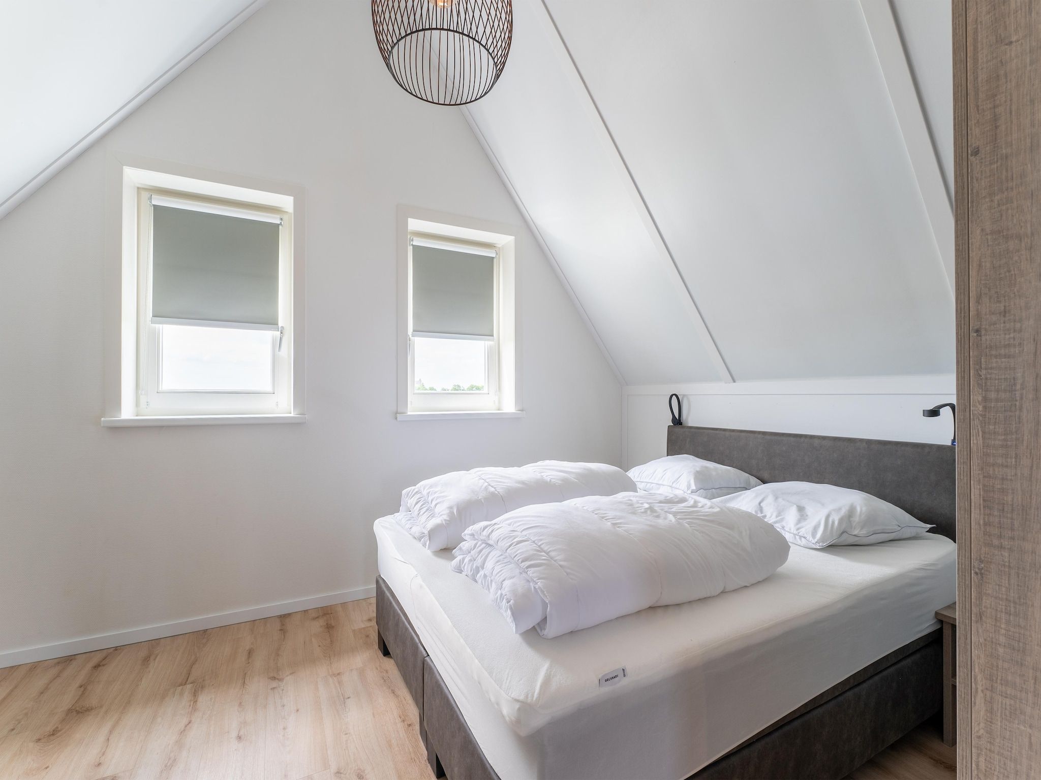 Een slaapkamer van Wulpdal Huis Nr 51 in Scherpenisse