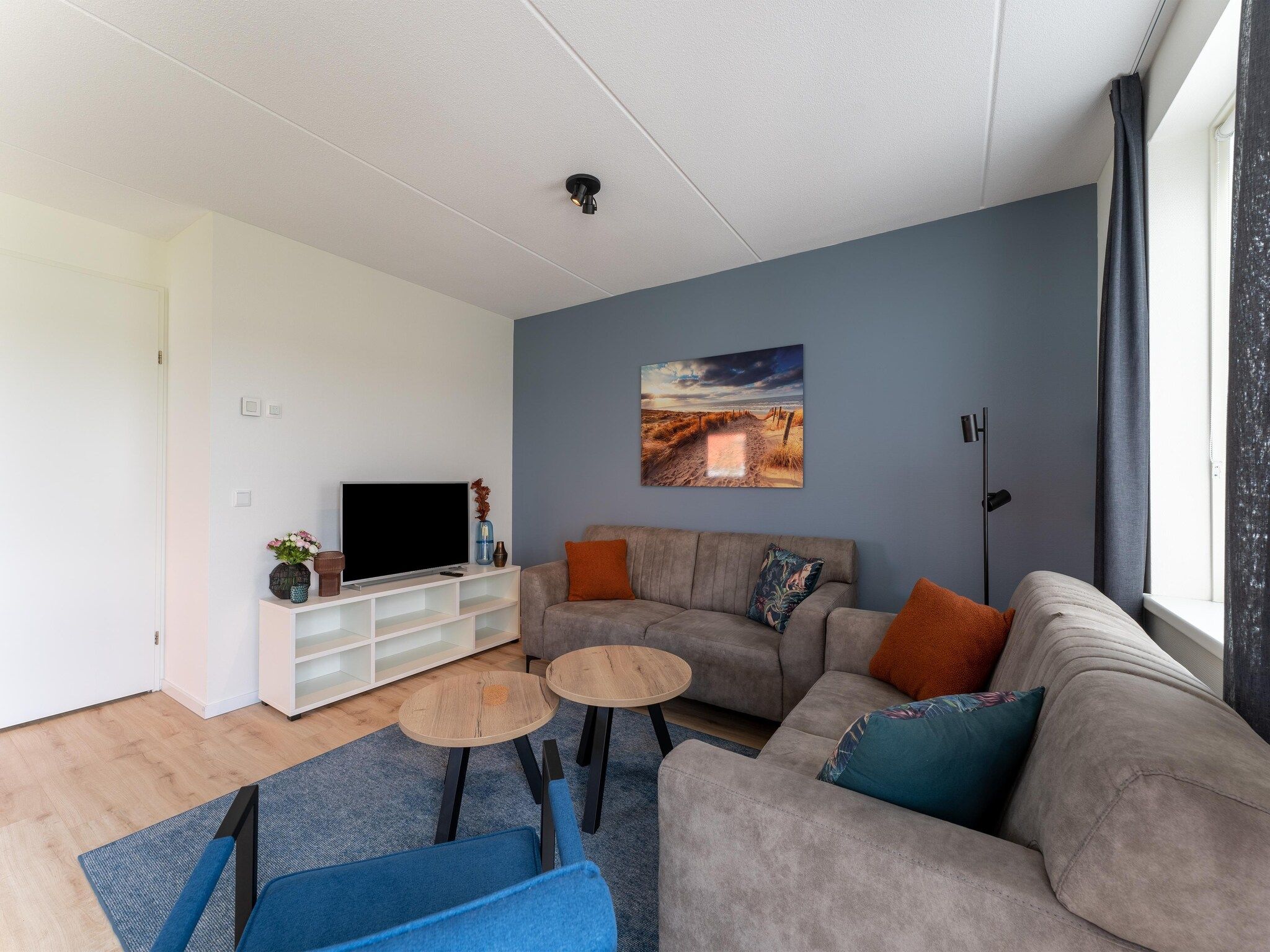 De woonkamer van Wulpdal Huis Nr 51 in Scherpenisse