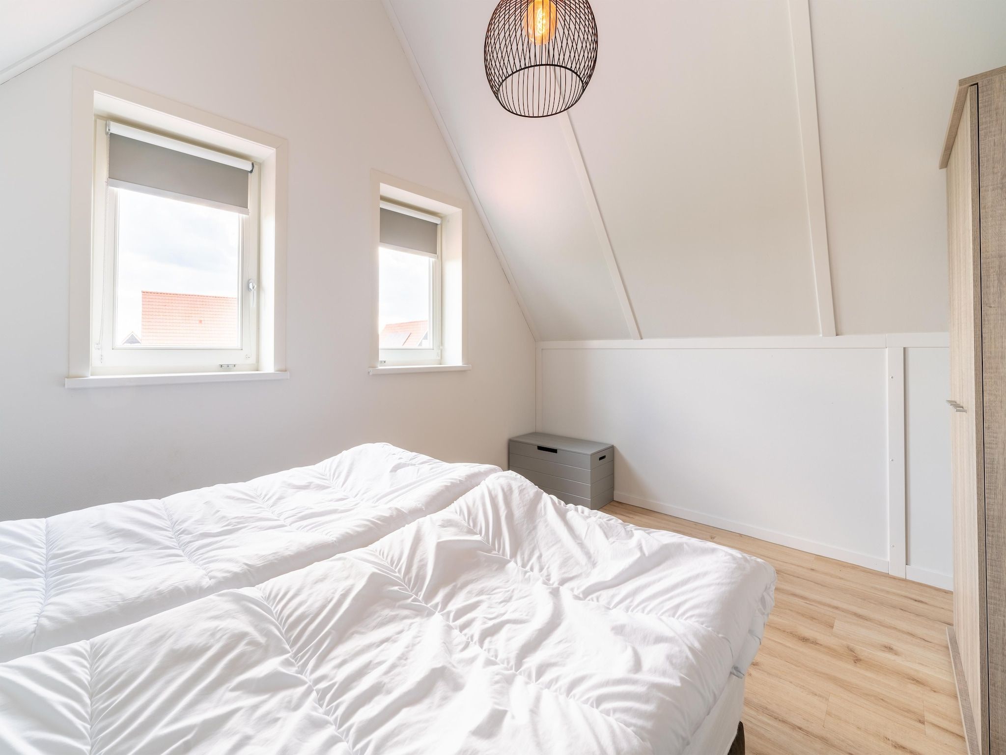 Een slaapkamer van De Kluut Huis Nr 12 in Scherpenisse