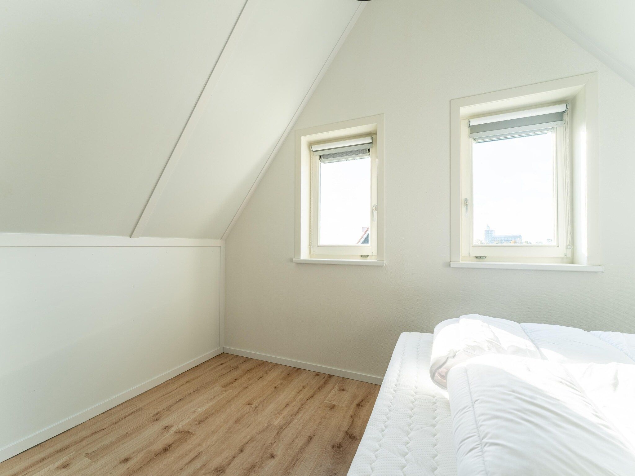 Een slaapkamer van De Merel Huis  Nr 44 in Scherpenisse