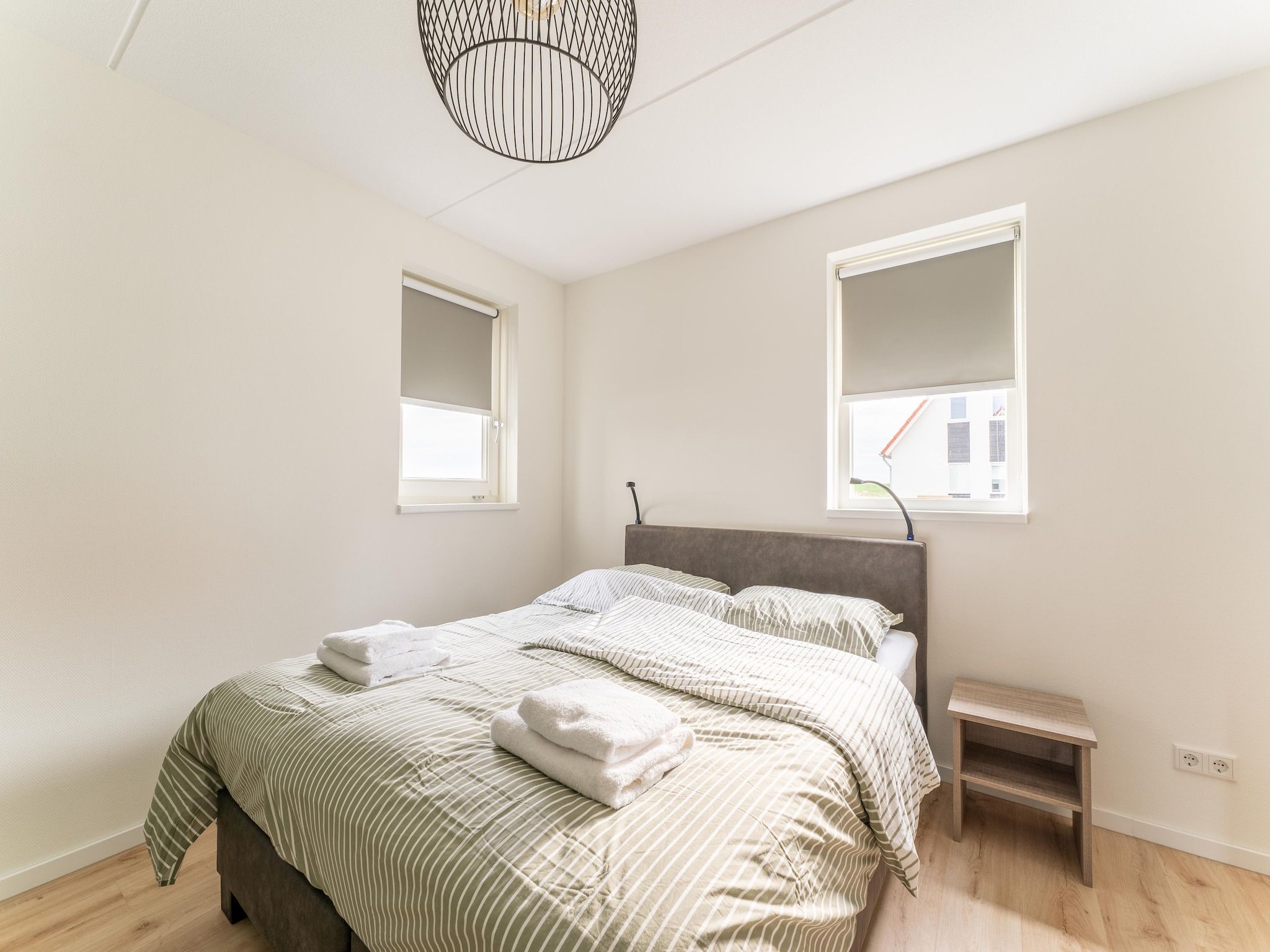 Een slaapkamer van De Reiger Huis Nr 46 in Scherpenisse