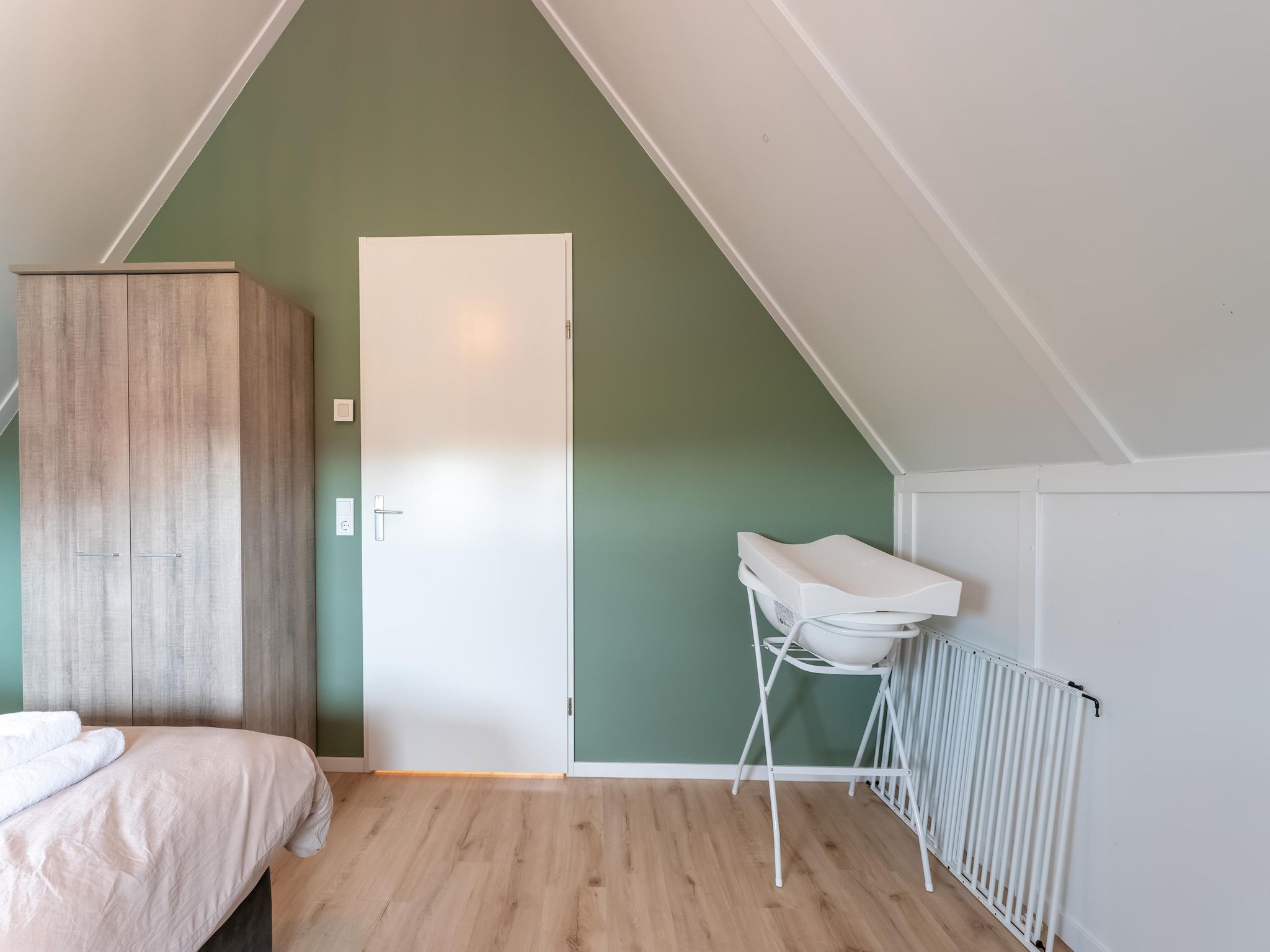 Een slaapkamer van De Reiger Huis Nr 46 in Scherpenisse