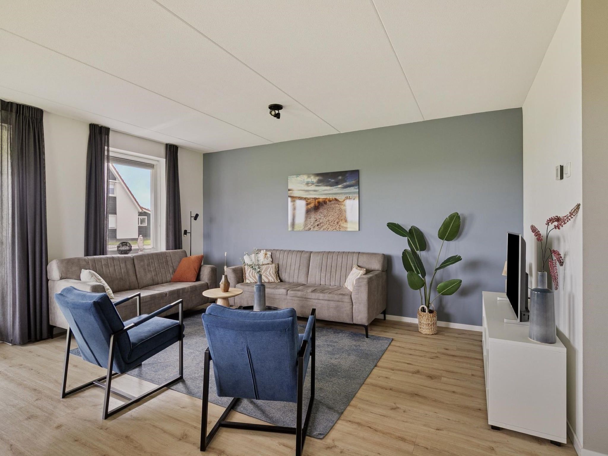 De woonkamer van De Ooievaar Huis Nr 47 in Scherpenisse