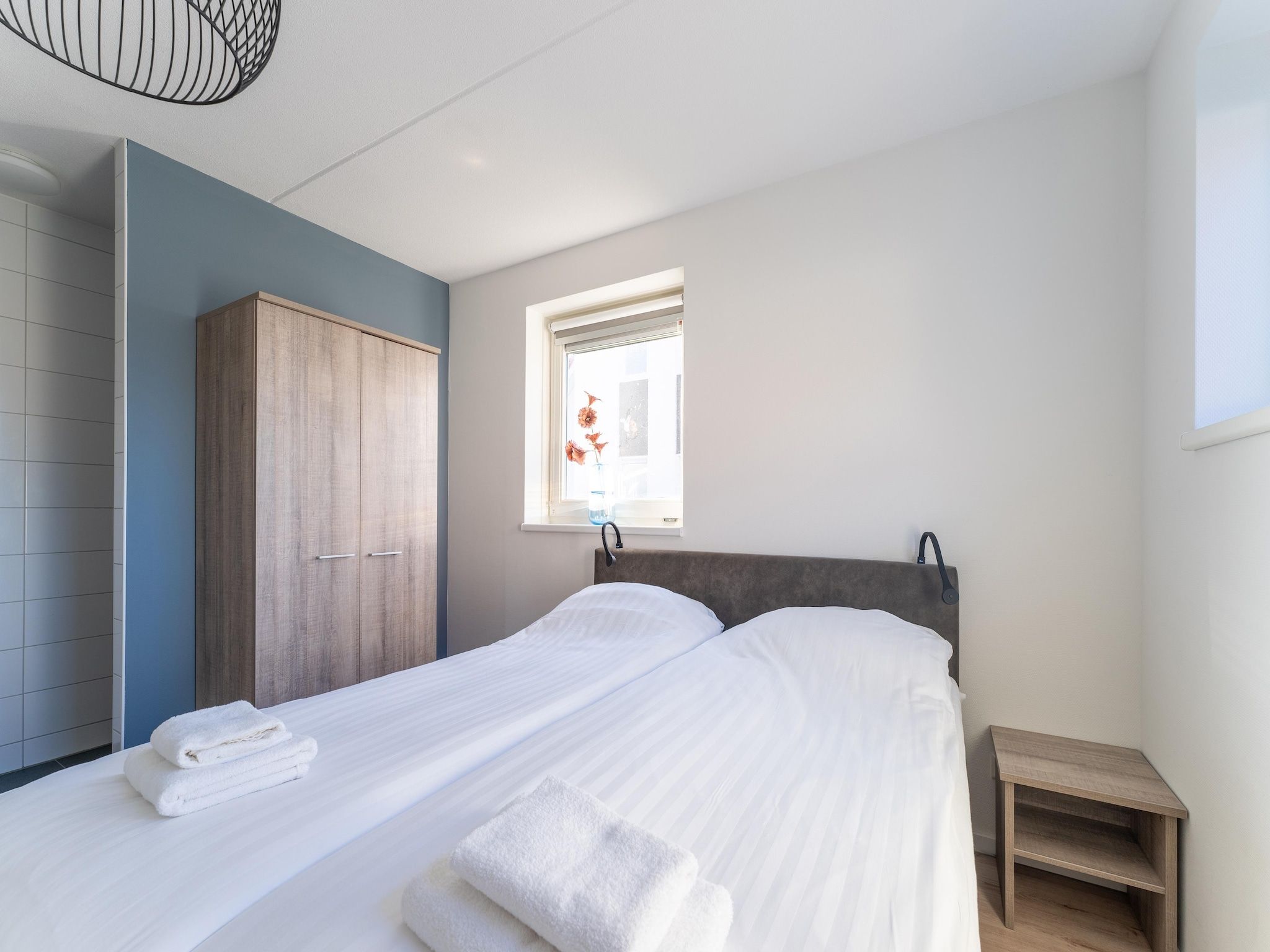 Een slaapkamer van De Roodborst Huis Nr 31 in Scherpenisse