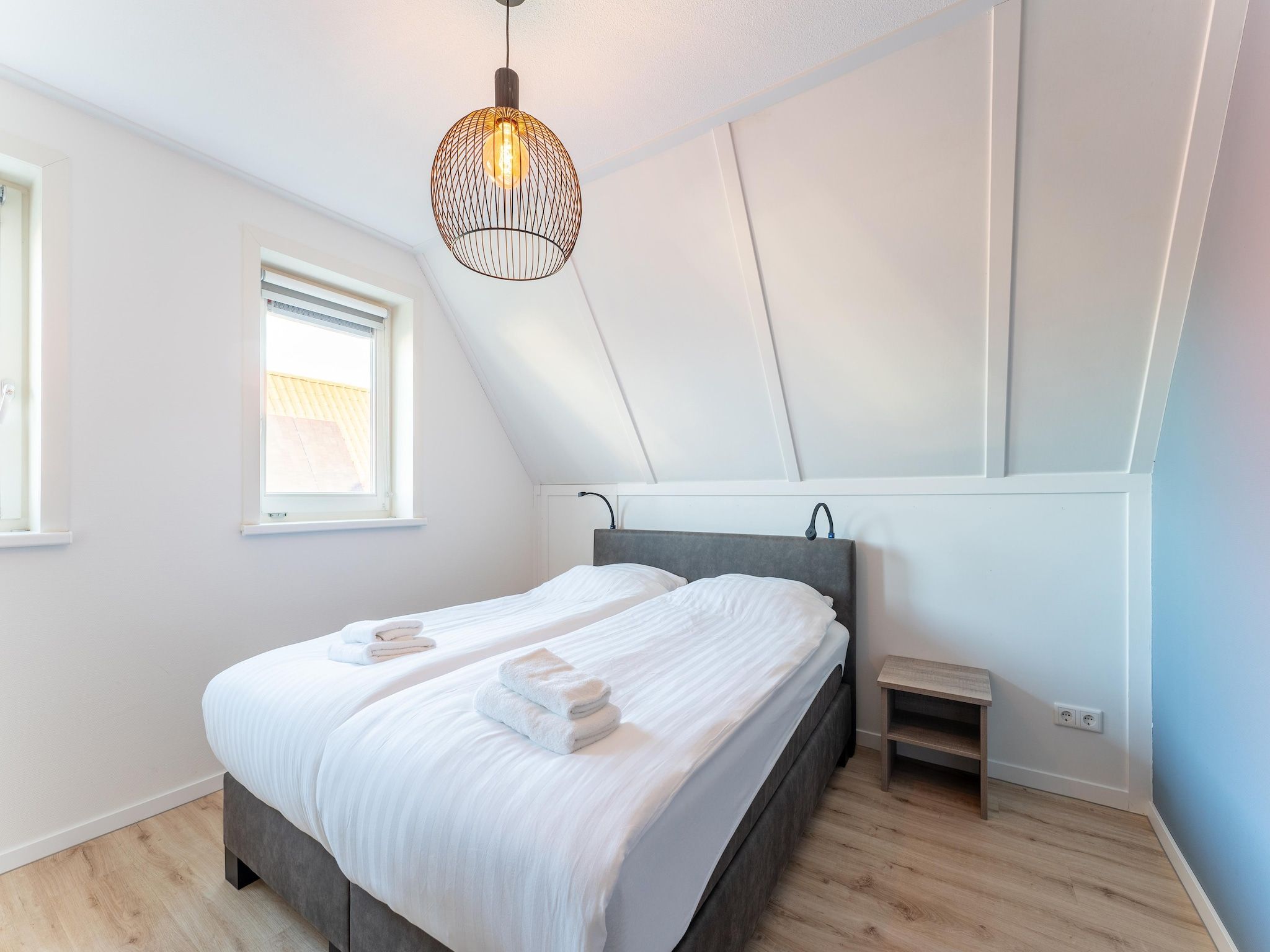 Een slaapkamer van De Roodborst Huis Nr 31 in Scherpenisse