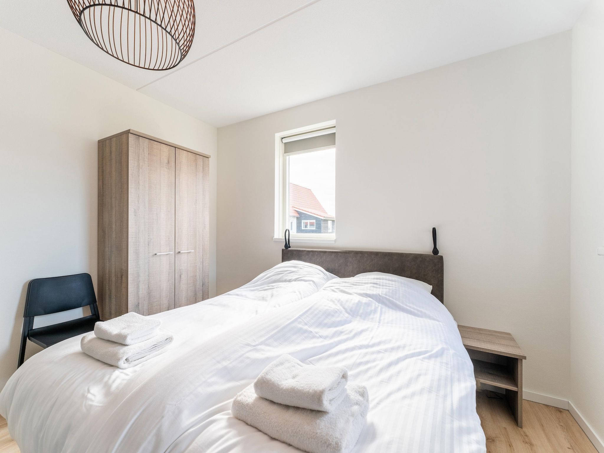 Een slaapkamer van De Pelikaan Huis Nr 45 in Scherpenisse