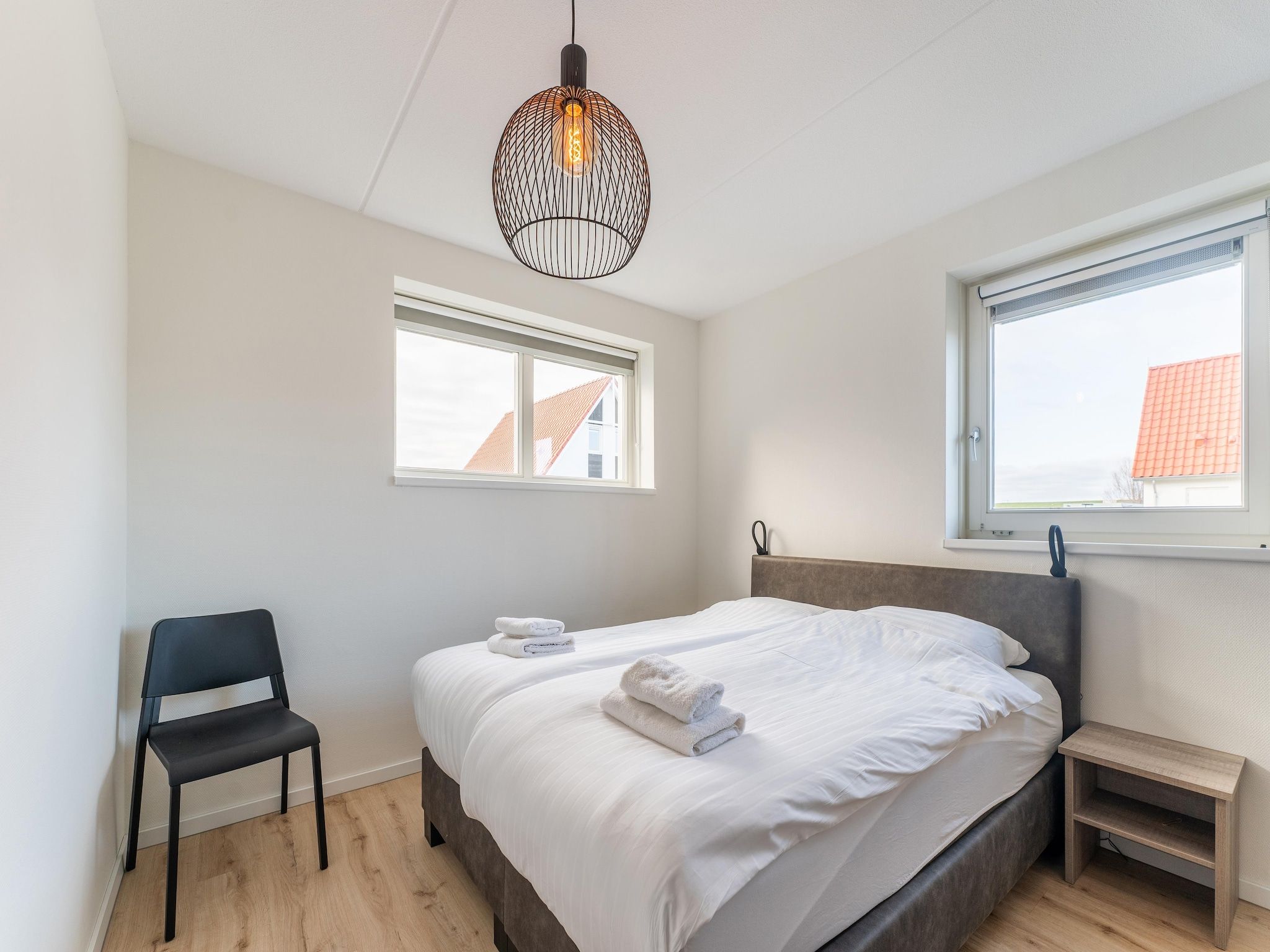 Een slaapkamer van De Pelikaan Huis Nr 45 in Scherpenisse