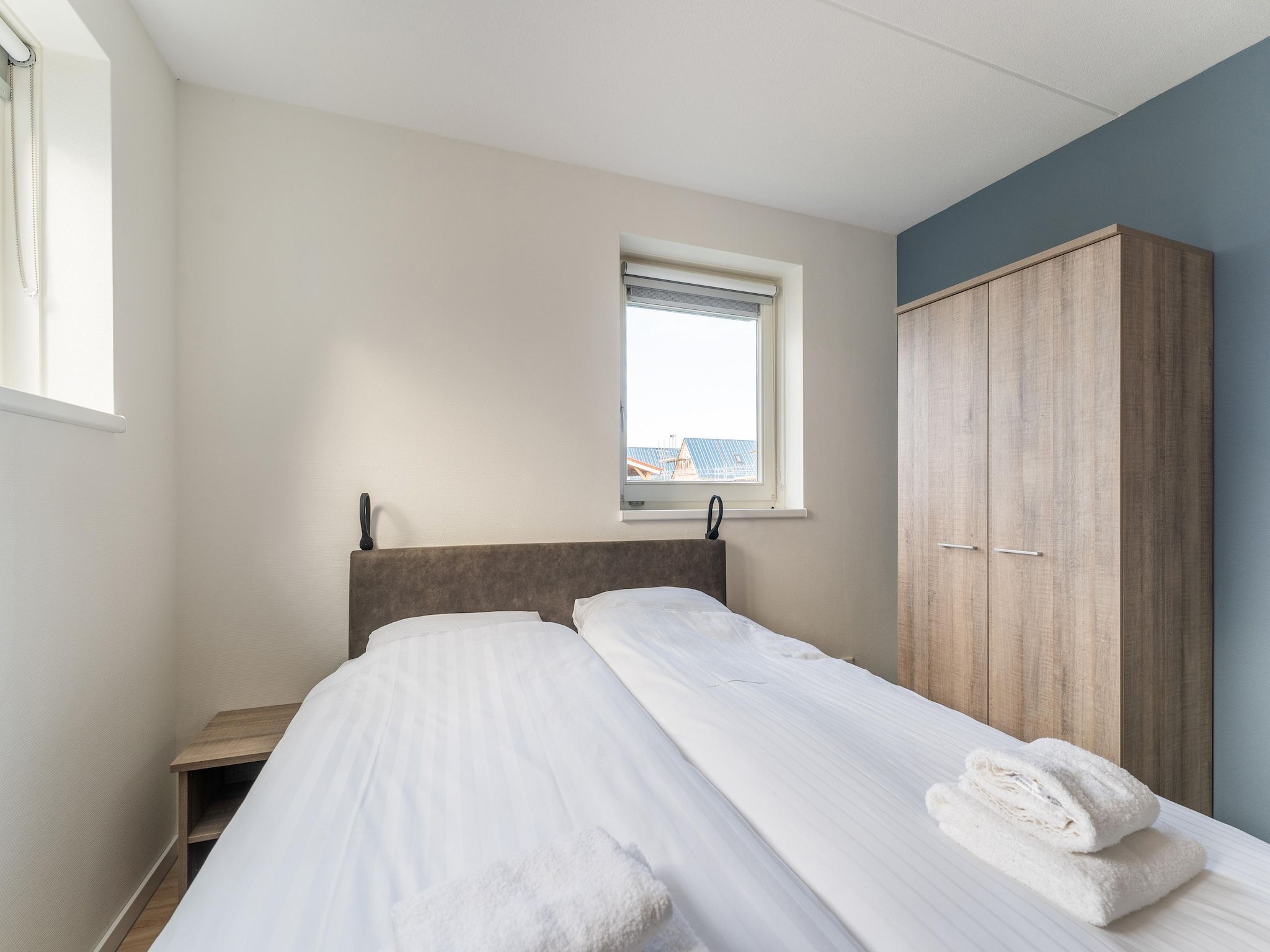 Een slaapkamer van De Pelikaan Huis Nr 45 in Scherpenisse