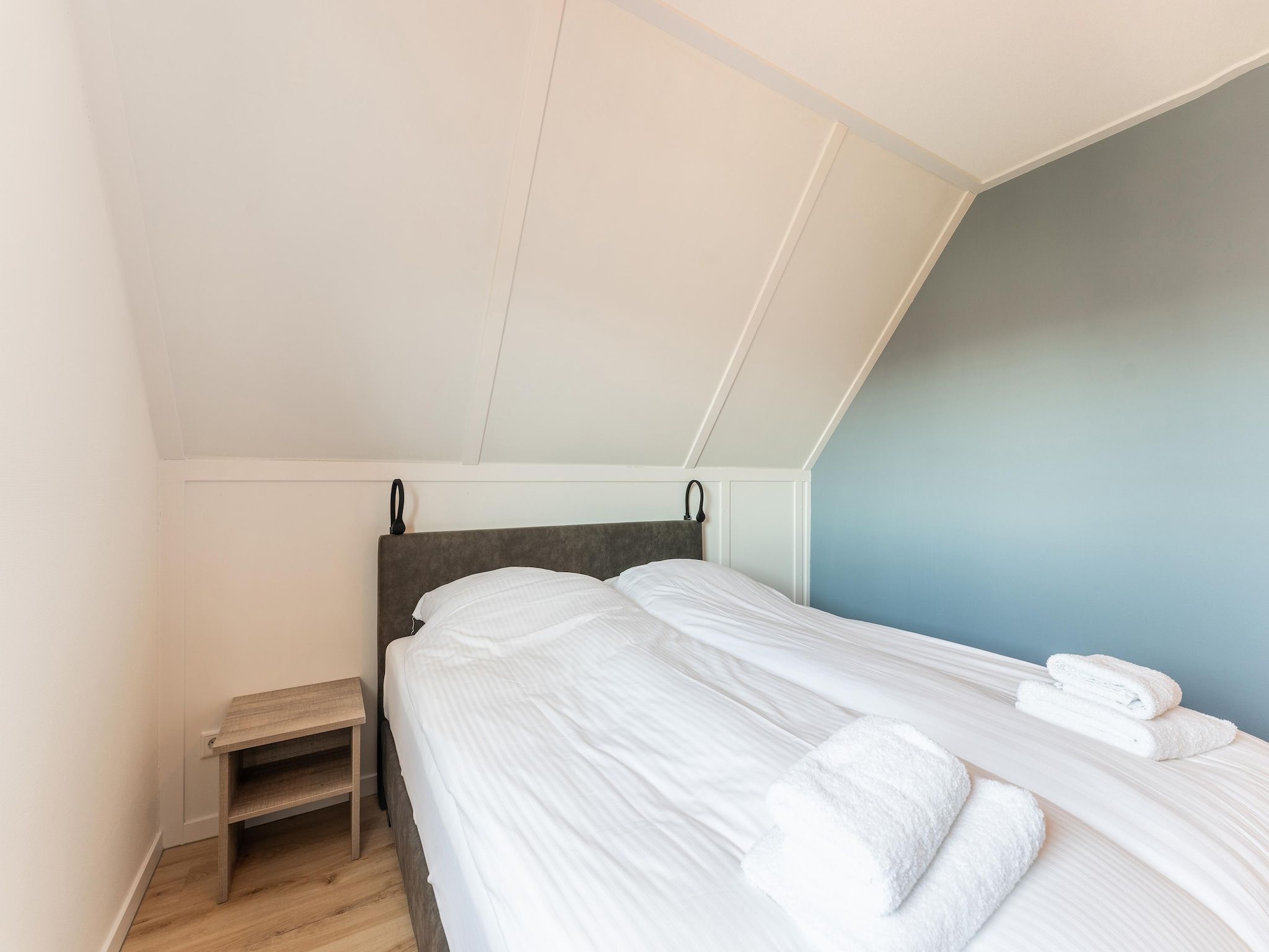 Een slaapkamer van De Pelikaan Huis Nr 45 in Scherpenisse