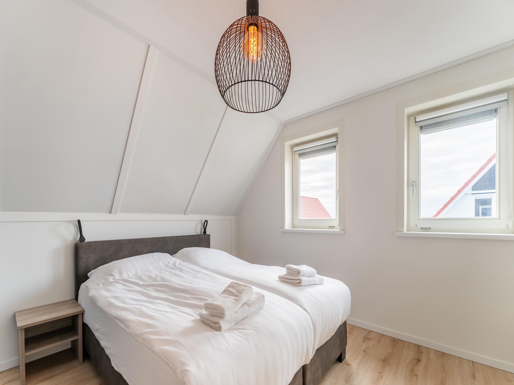 Een slaapkamer van De Pelikaan Huis Nr 45 in Scherpenisse