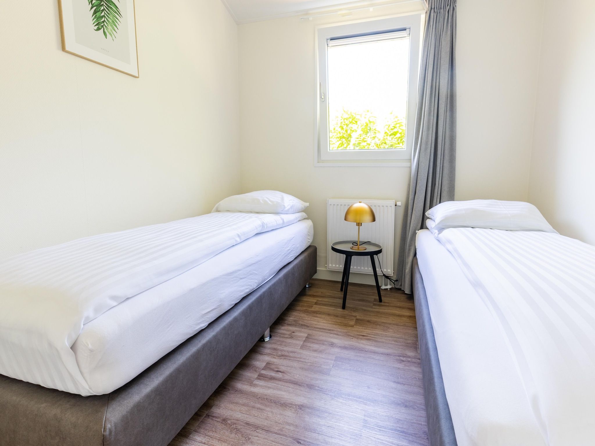 Een slaapkamer van Vakantiepark Molenvelden 1 in Veldhoven