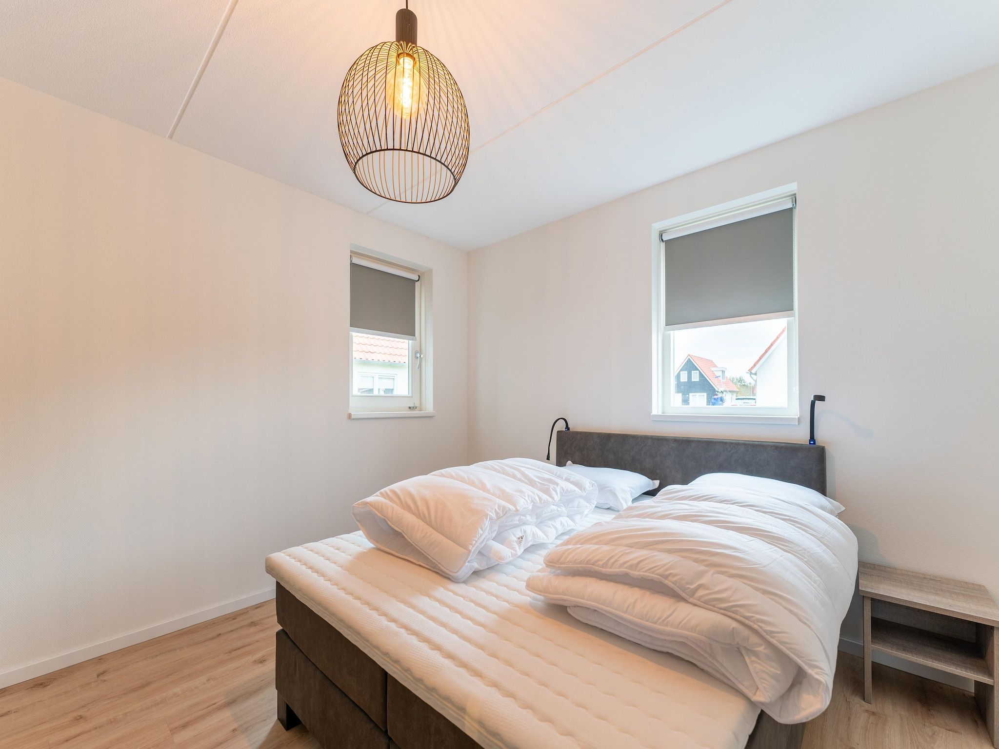 Een slaapkamer van De Albatros Huis Nr 49 in Scherpenisse