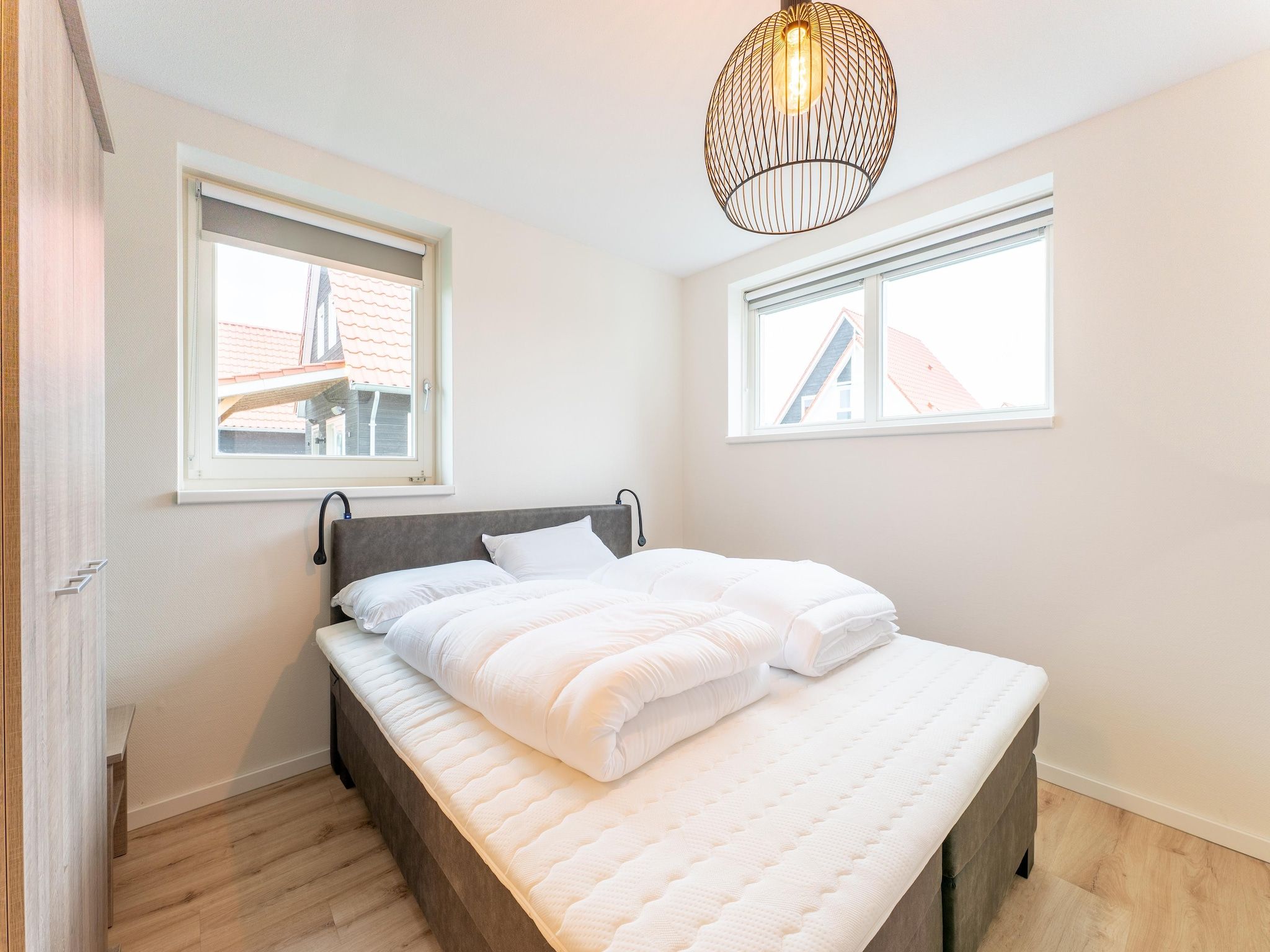 Een slaapkamer van De Albatros Huis Nr 49 in Scherpenisse