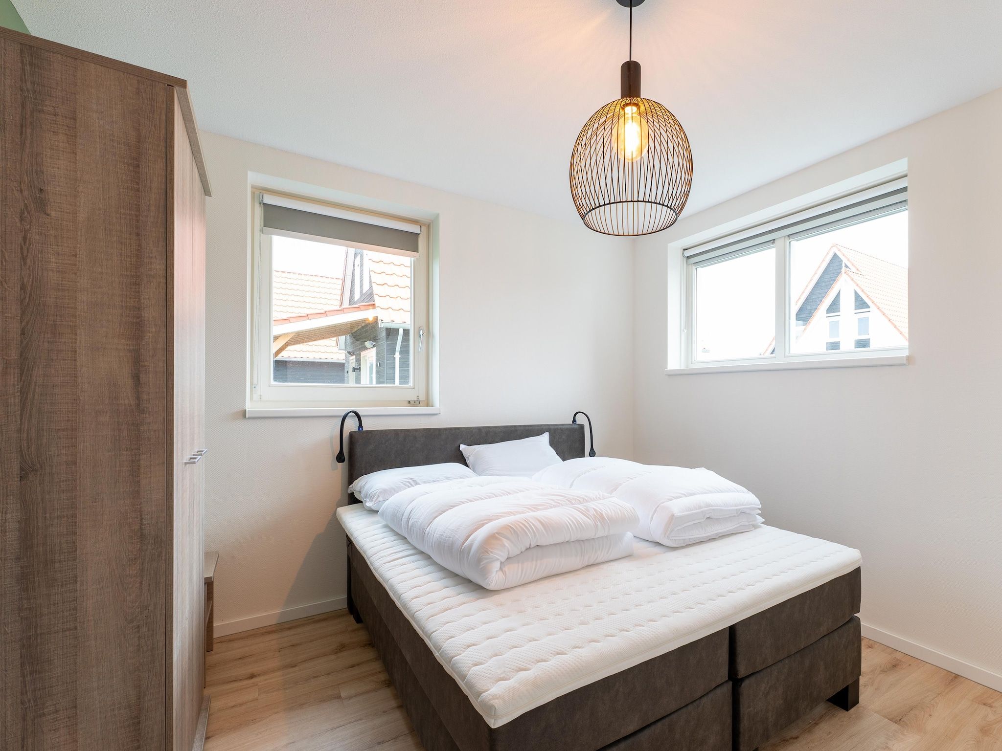 Een slaapkamer van De Albatros Huis Nr 49 in Scherpenisse