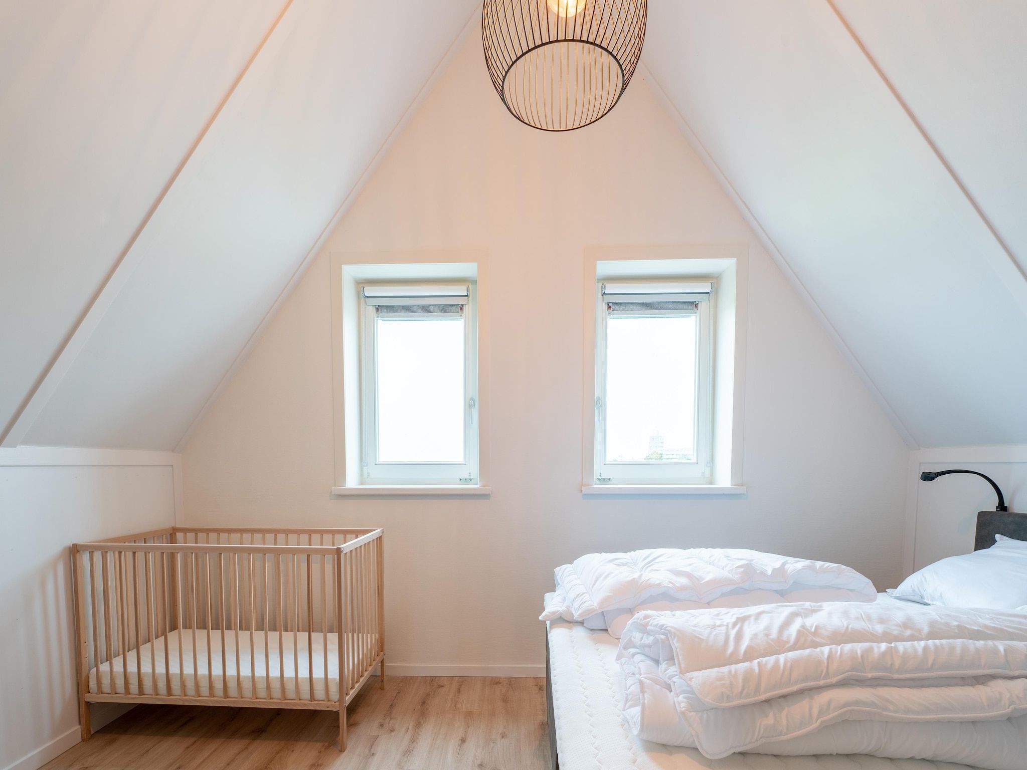 Een slaapkamer van De Albatros Huis Nr 49 in Scherpenisse