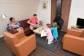 Bosrandvilla met sauna in Hoenderloo