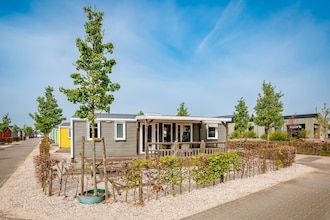 Chalet bij Maurikmeer met Hangmat in Maurik