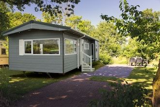 Chalet aan de Regge met Sauna in Zuna