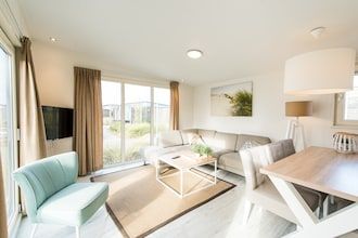 Chique chalet vlakbij het strand in Hollum