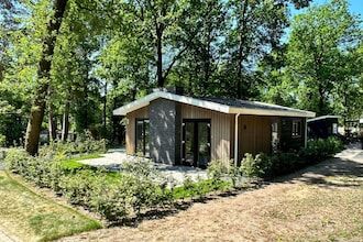 Chalet met tuin en uitzicht in Hoenderloo