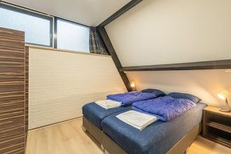 Bosbungalow met barbecue in Stramproy