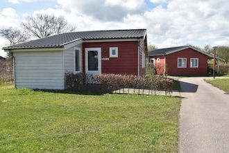 Vakantiehuis met overdekt terras en zwembad in Someren-Heide