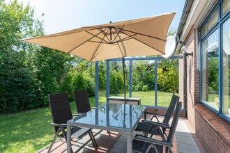 Eureka 78 bungalow met omheinde tuin in Sint Maartensvlotbrug