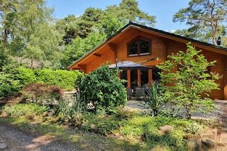 Villa in het bos met privé sauna in Markelo