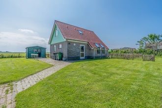 Vrijstaande vakantiewoning met landelijk uitzicht in De Cocksdorp