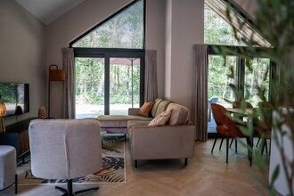 Moderne luxe ecovilla met terras aan het water in Oirschot